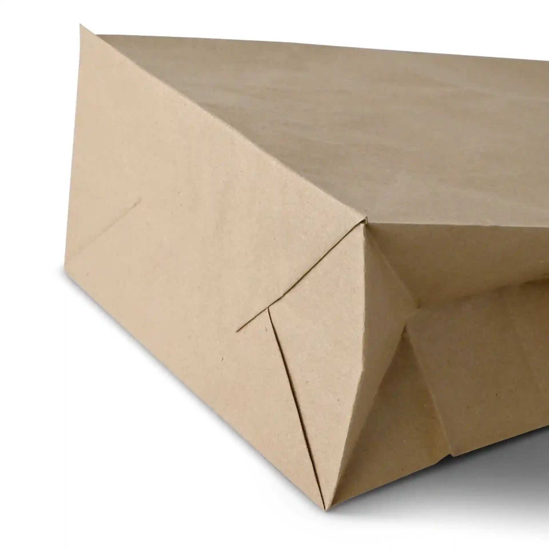 Brown rectangular paper bag with folded corners, showing the bottom edge and side seam.