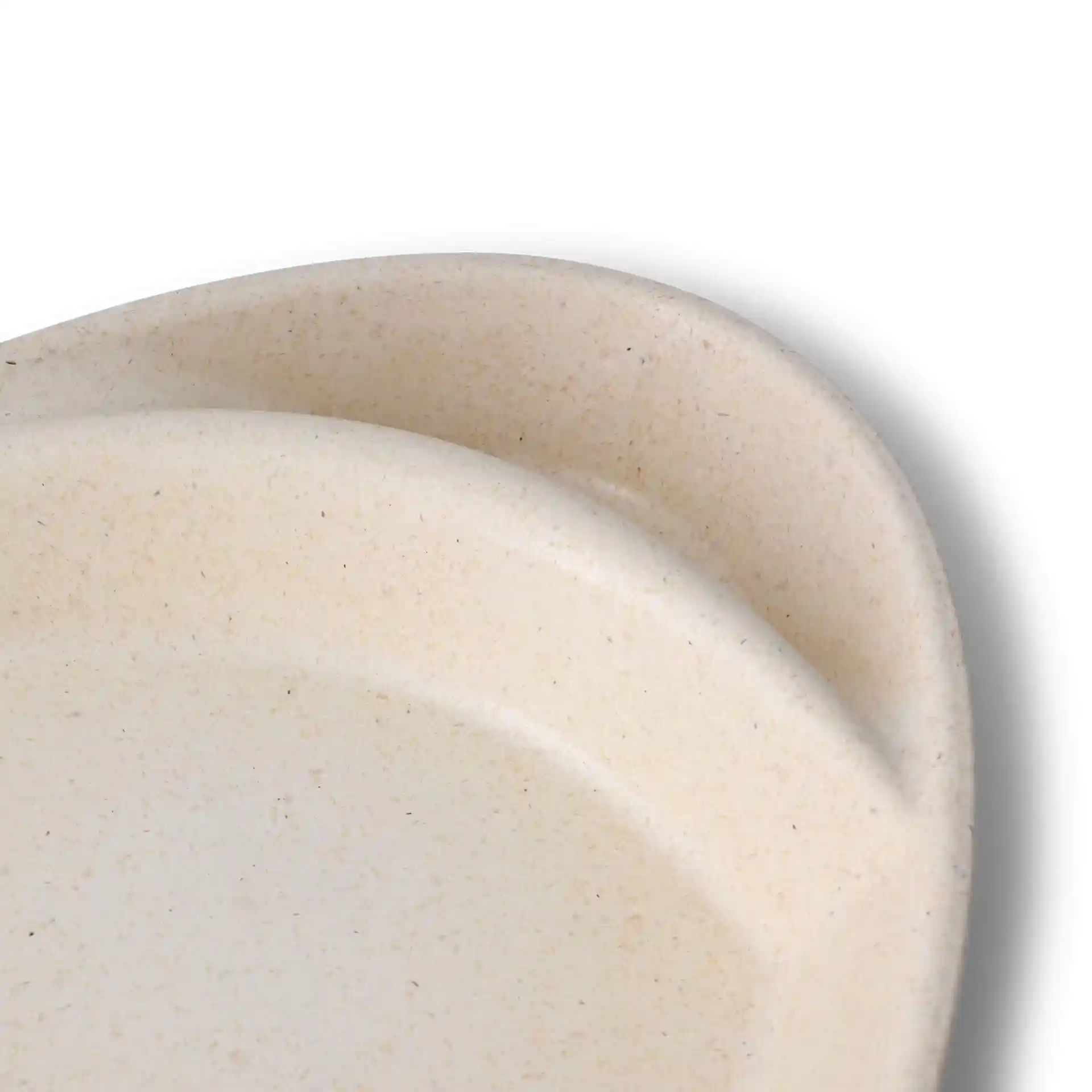 Creamy white reusable divided plate with two compartments, featuring a smooth surface and rounded edges.