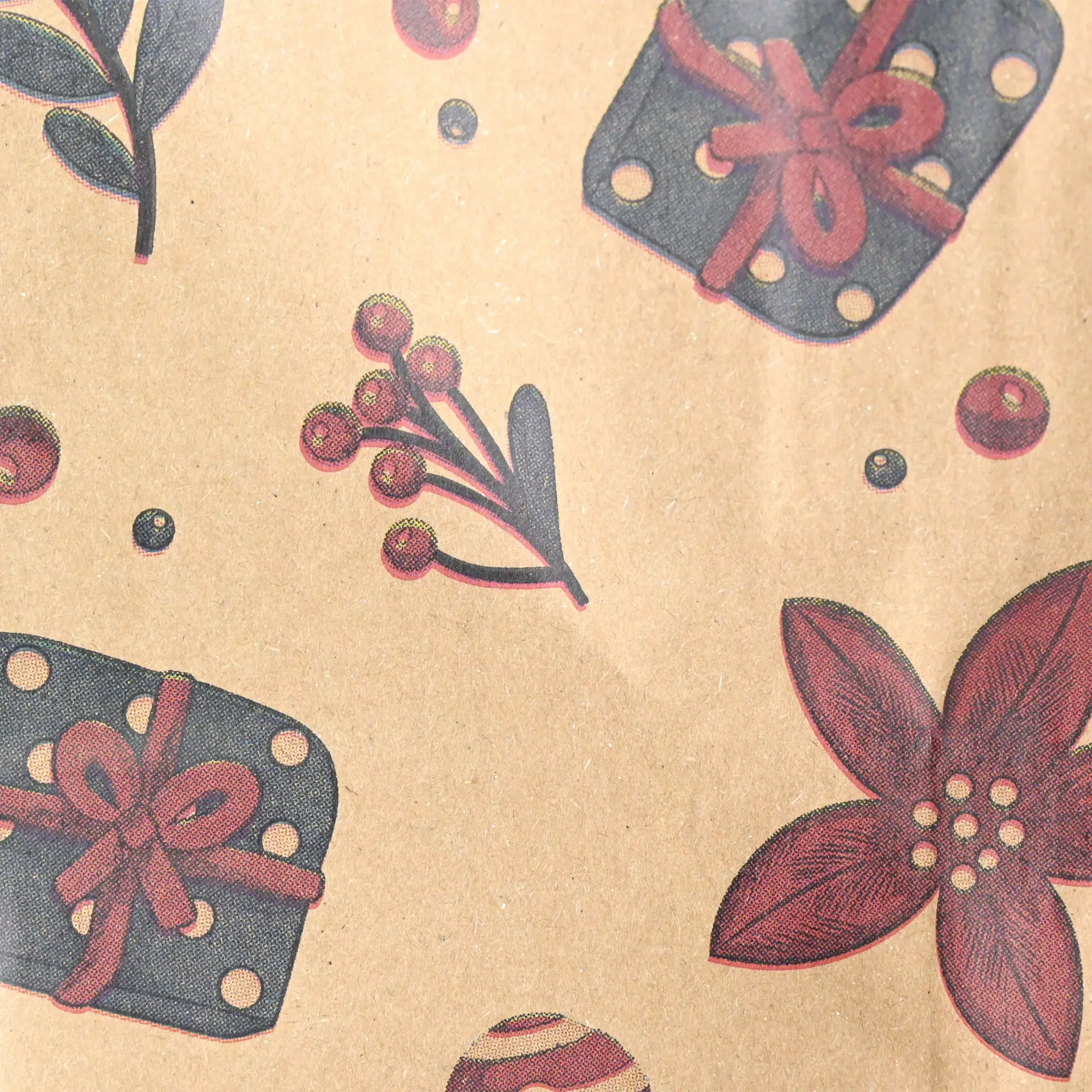 Brown paper carrier bag with winter design featuring gifts, berries, and flowers on a textured background.