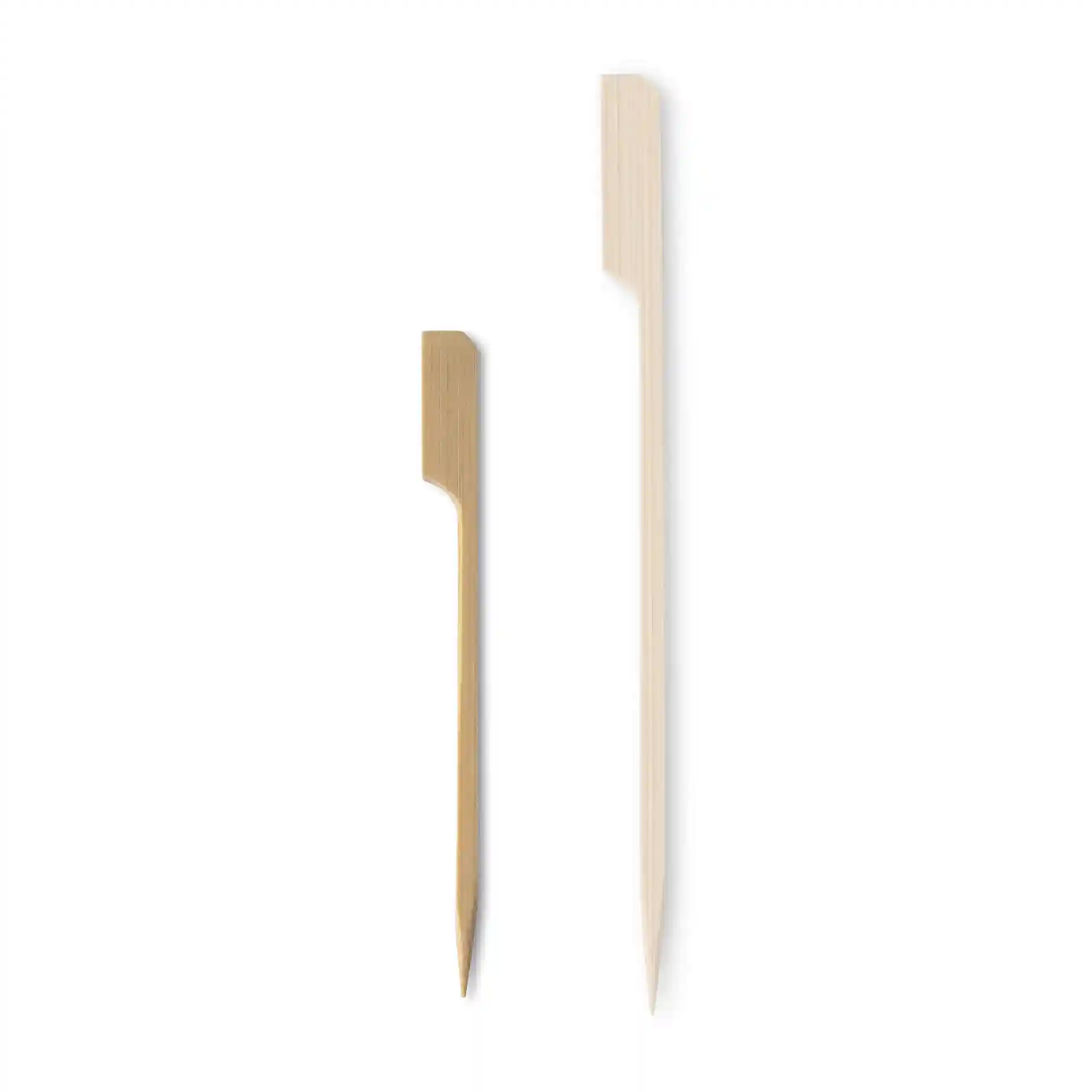 Two bamboo paddle skewers, one shorter and brown, the other longer and light-colored, on a plain background.