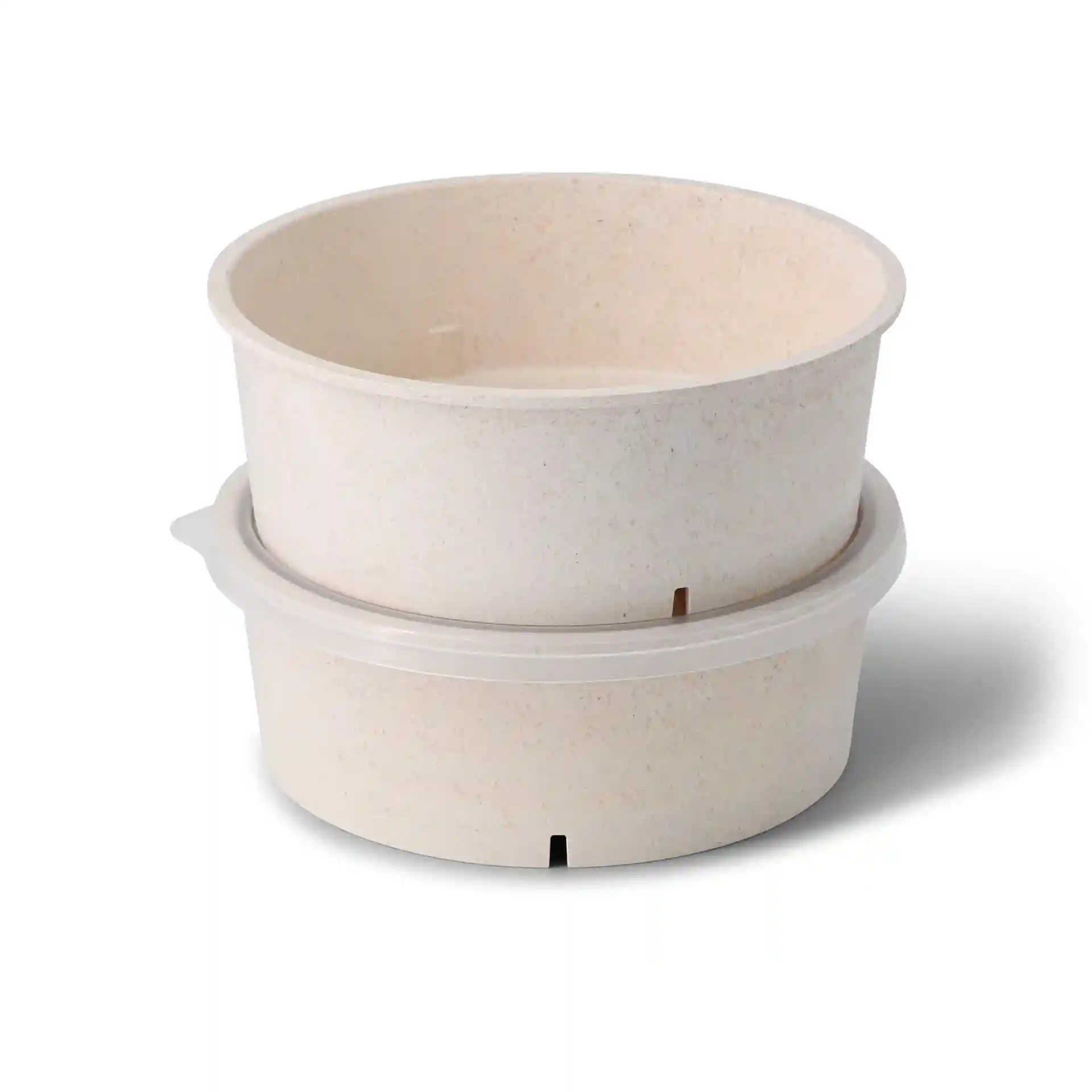 Round reusable bowls in cream white, stacked, made from bio compound, with a capacity of 1000 ml.