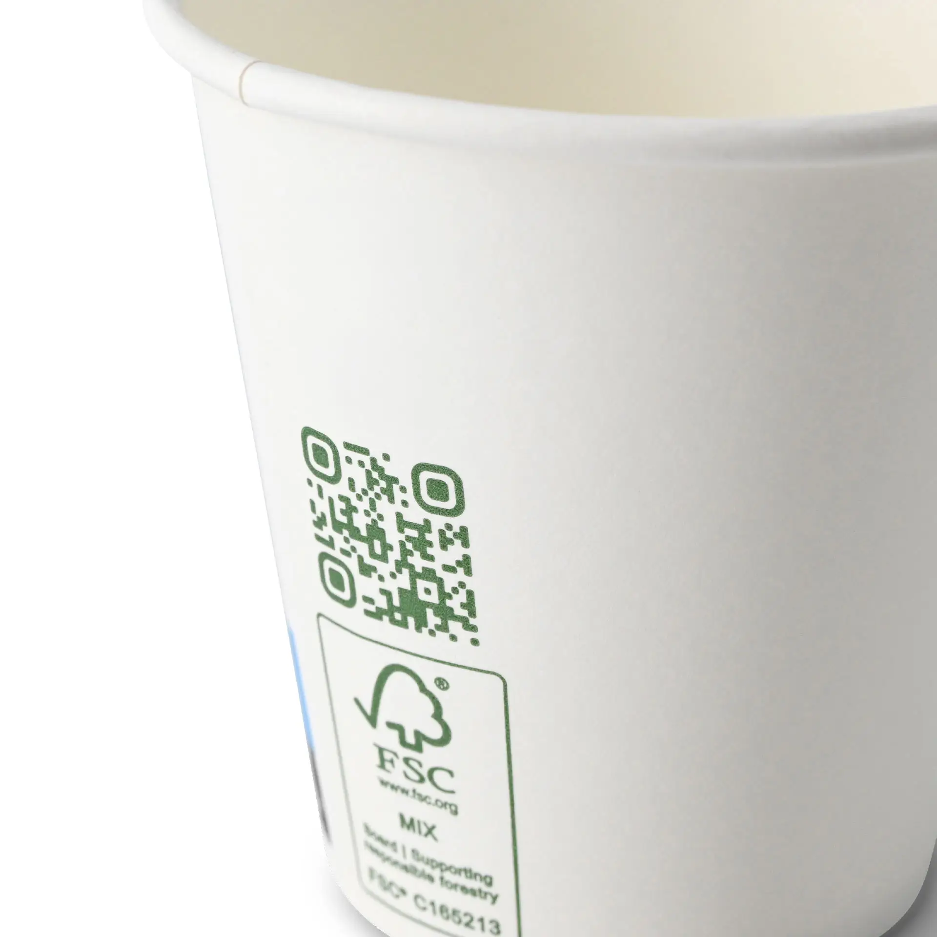 White paper cup with a QR code and a green symbol on the side.