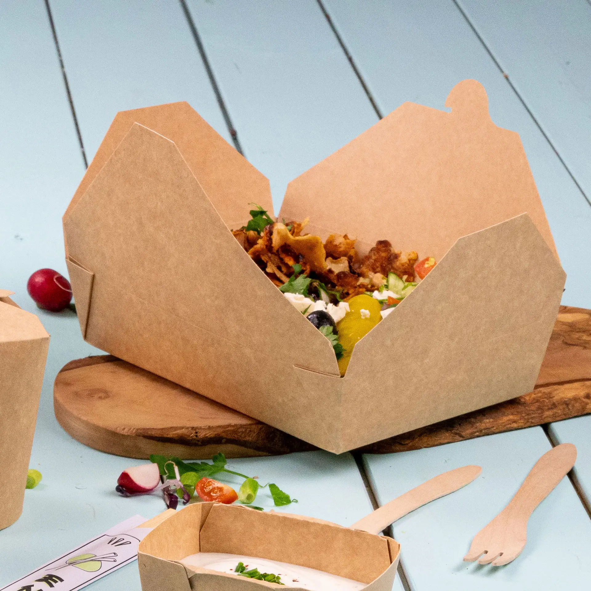 Cardboard take-away box with a foldable lid, dimensions 215 mm x 158 mm x 48 mm, brown color, suitable for various foods.