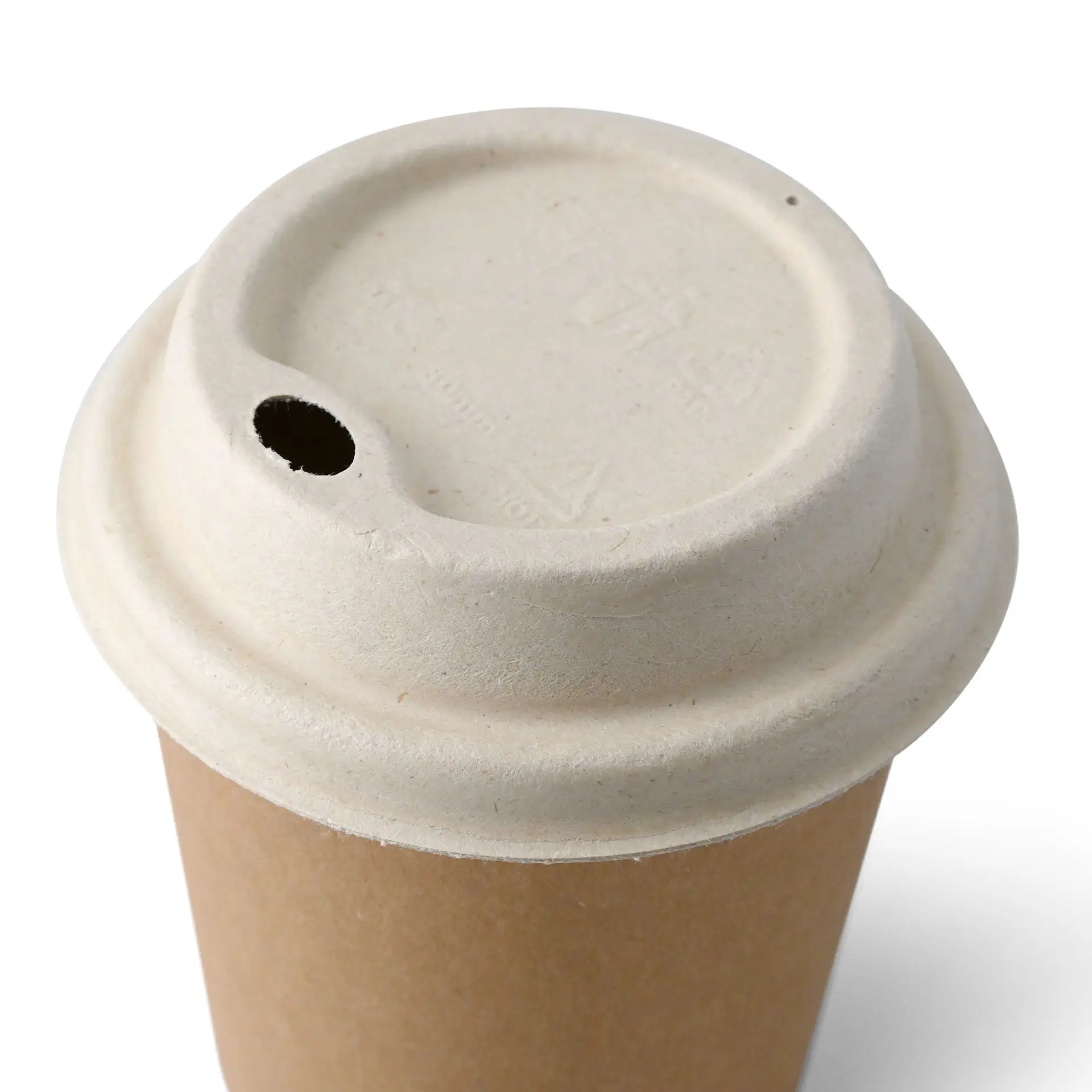 Brown sugarcane lid for paper cups with a drinking opening, suitable for hot and cold beverages.