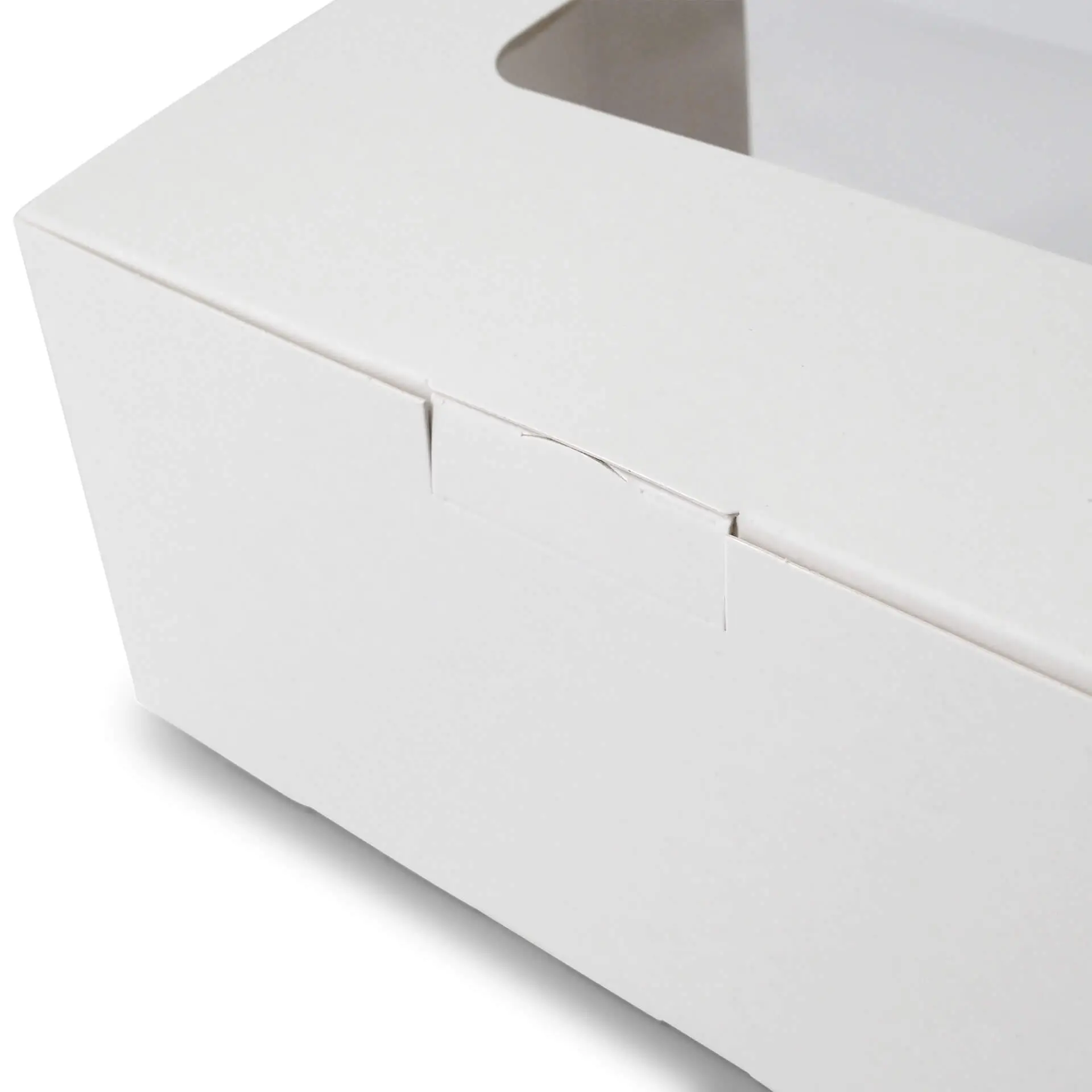 White 2-piece cupcake box with a cellulose window, suitable for holding small baked goods.