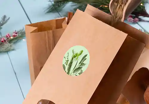 Custom printed label on a kraft paper container lid, showcasing a colorful design with the word "Logo."