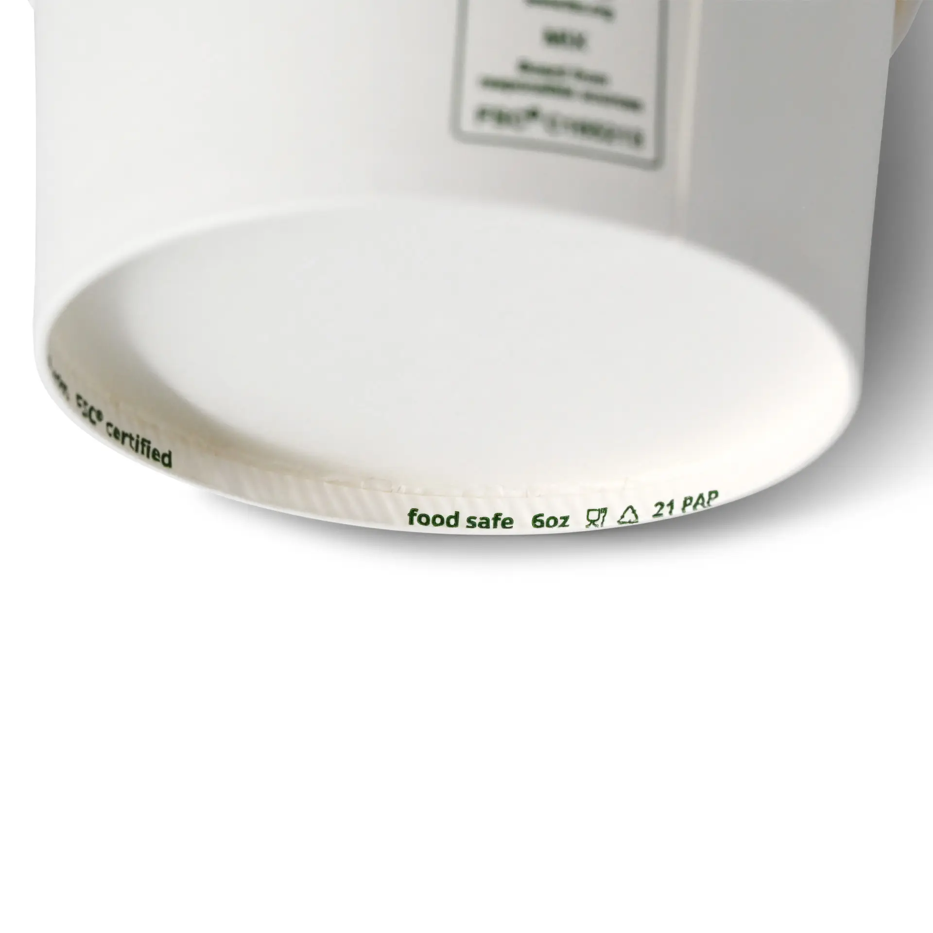 White paper ice cream cup with a diameter of 92 mm and a height of 48 mm, showing markings on the bottom.