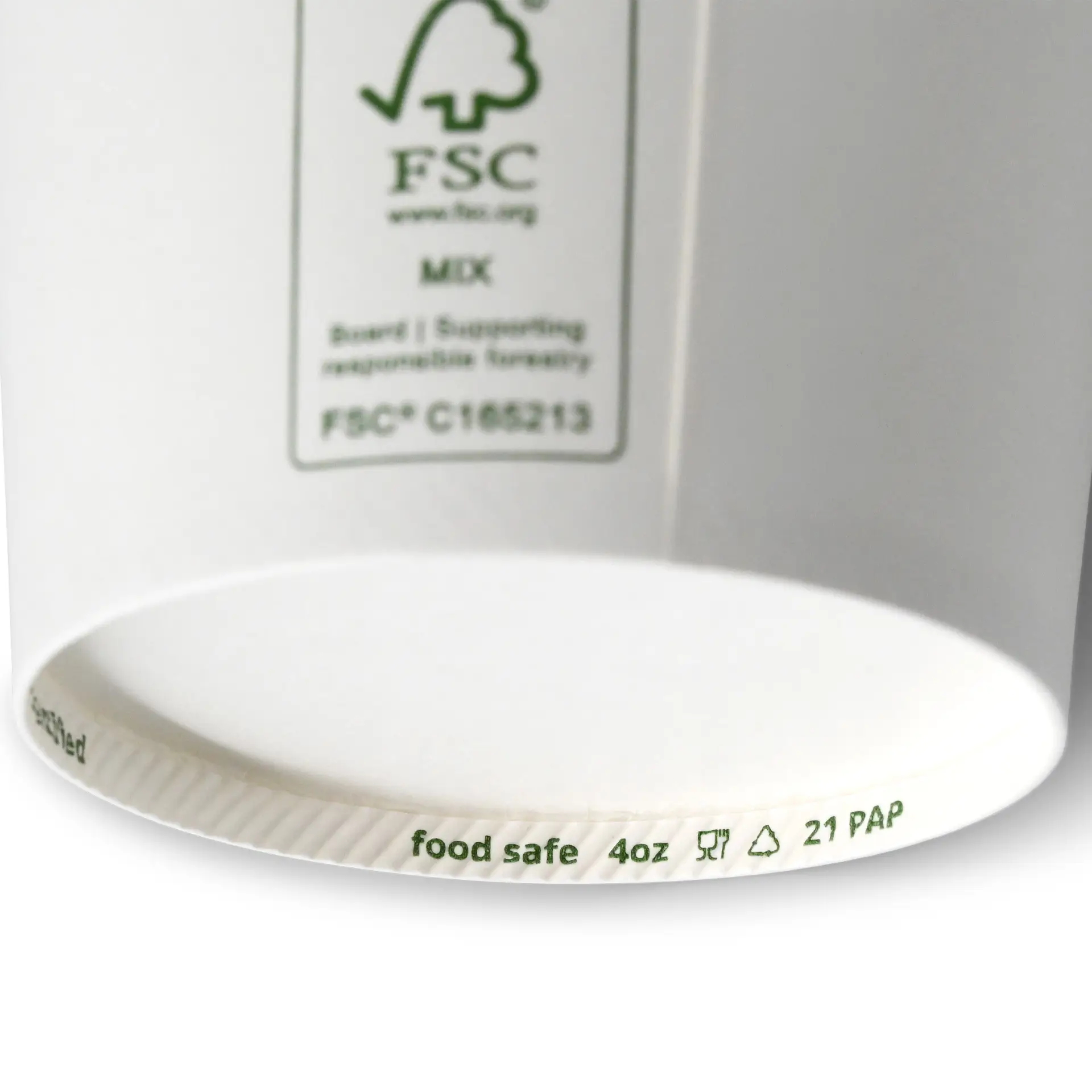 One white paper cup with a visible FSC certification label and marking indicating it is climate-safe and food-safe.