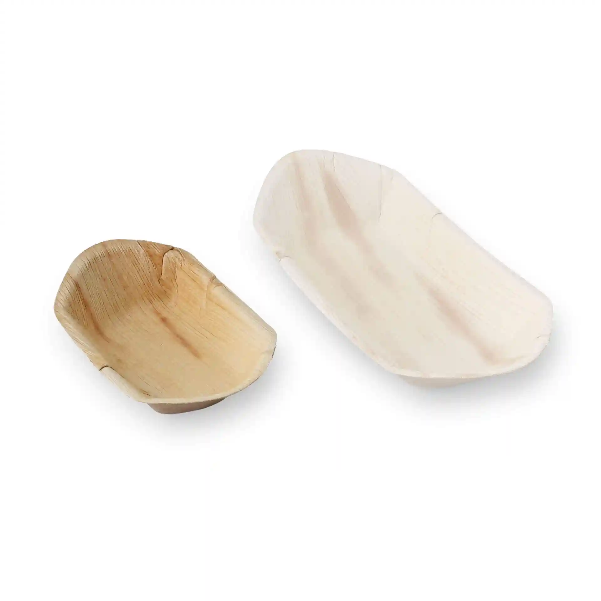 Two palm leaf boats in a boat shape, one larger and one smaller, displayed on a white background.
