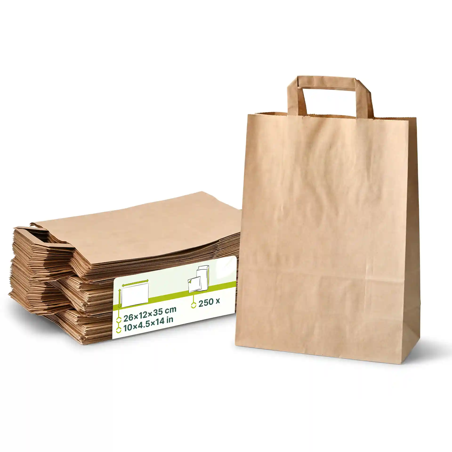 Brown kraft paper carrier bag standing next to a stack of similar bags, dimensions 26 x 12 x 35 cm.