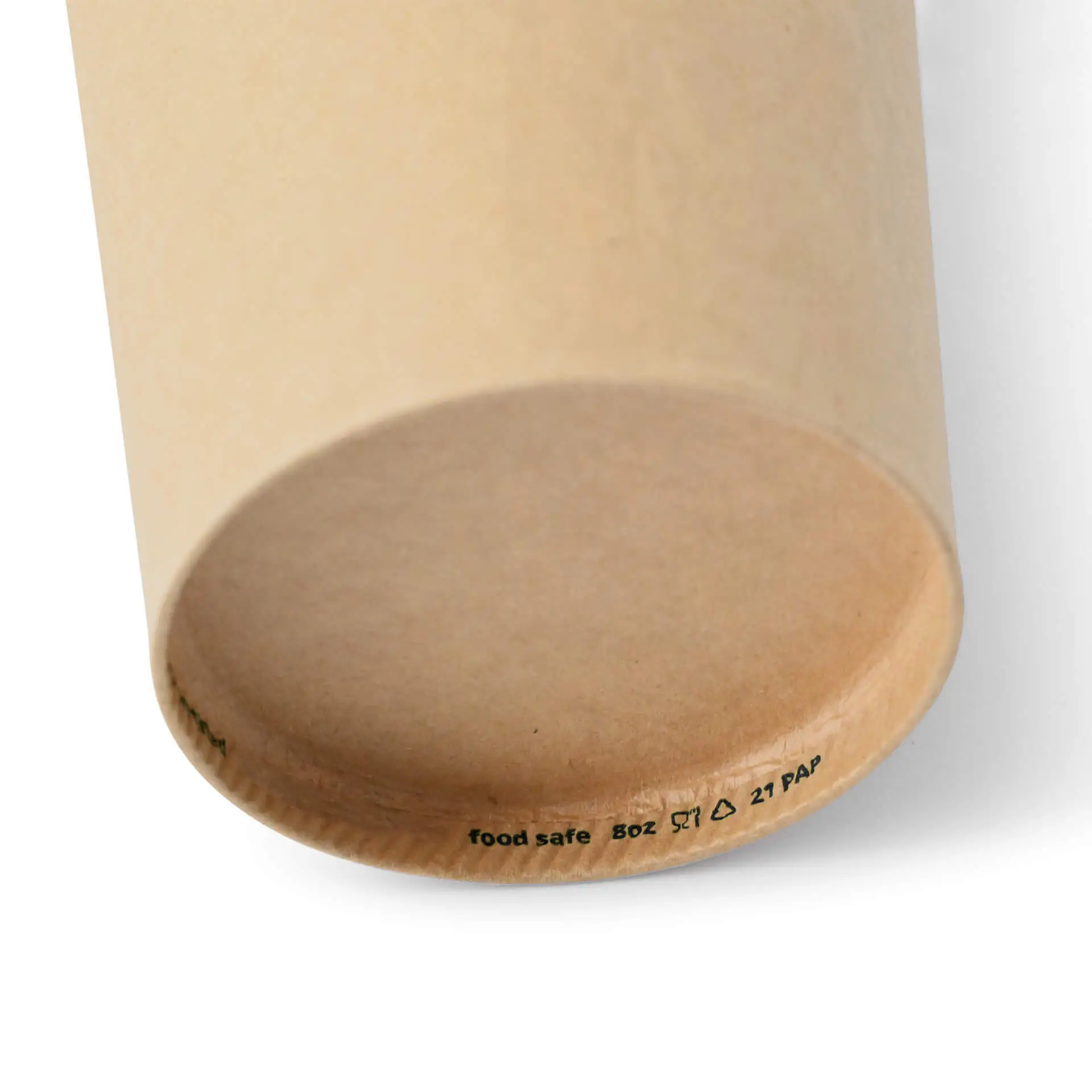 Brown paper cup with a round shape, showing the bottom with markings and a coated surface.