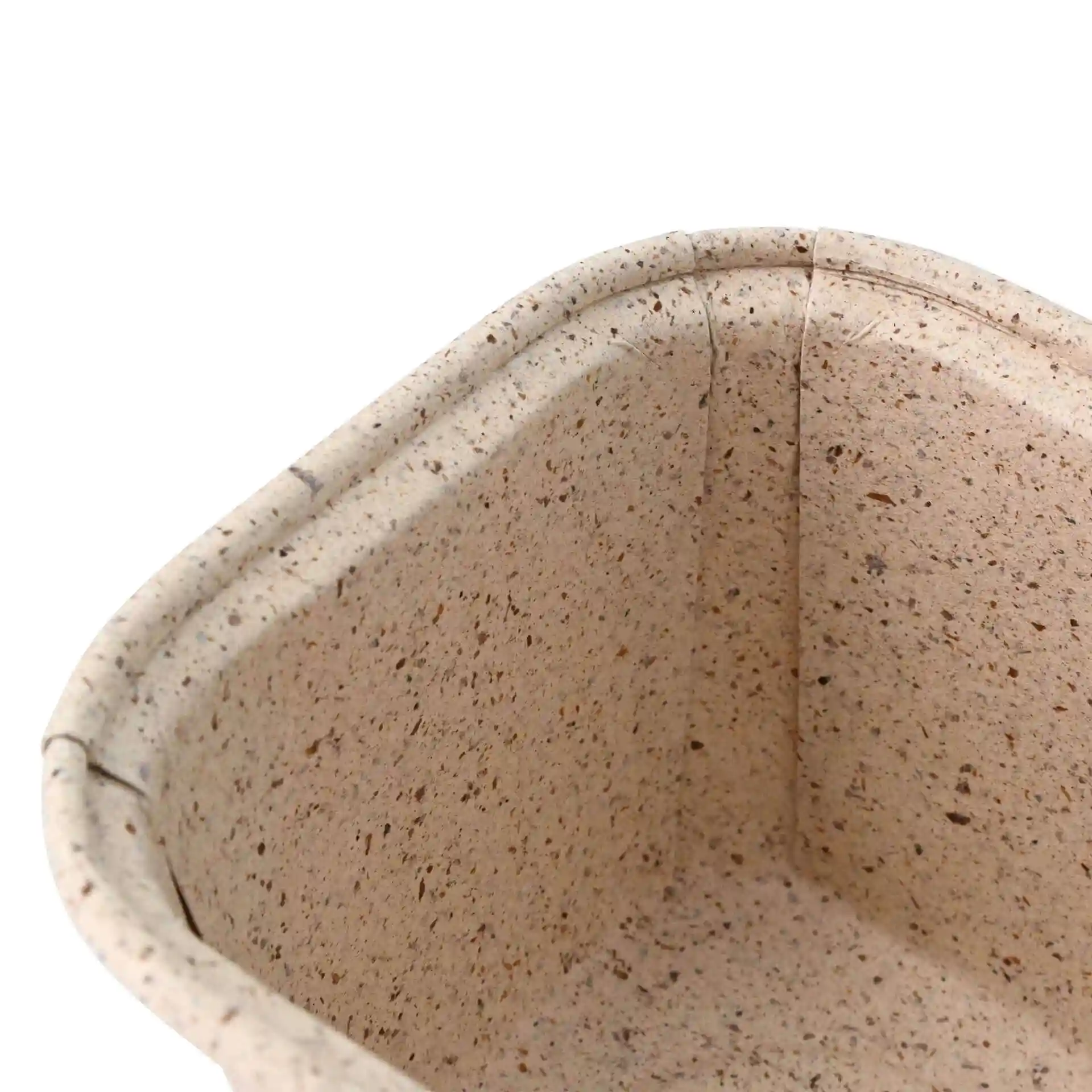 Rectangular baking mould made from brown cocoa paper, showing the interior and rounded edges.