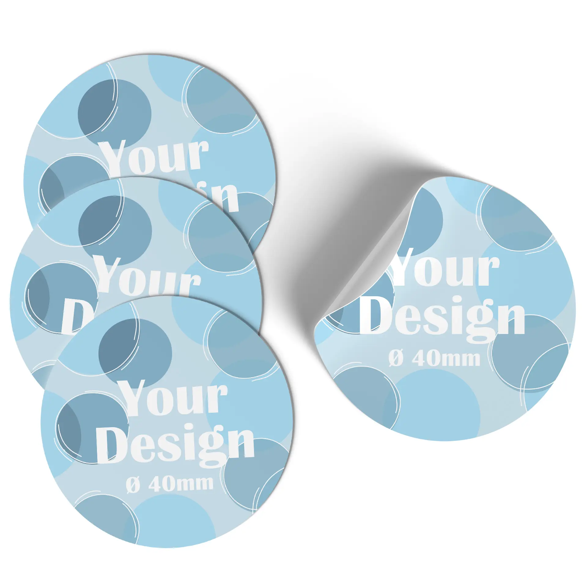 Custom printed round label roll, 4 cm with a design; positioned on a spool, showcasing a "Your Design" label pattern.