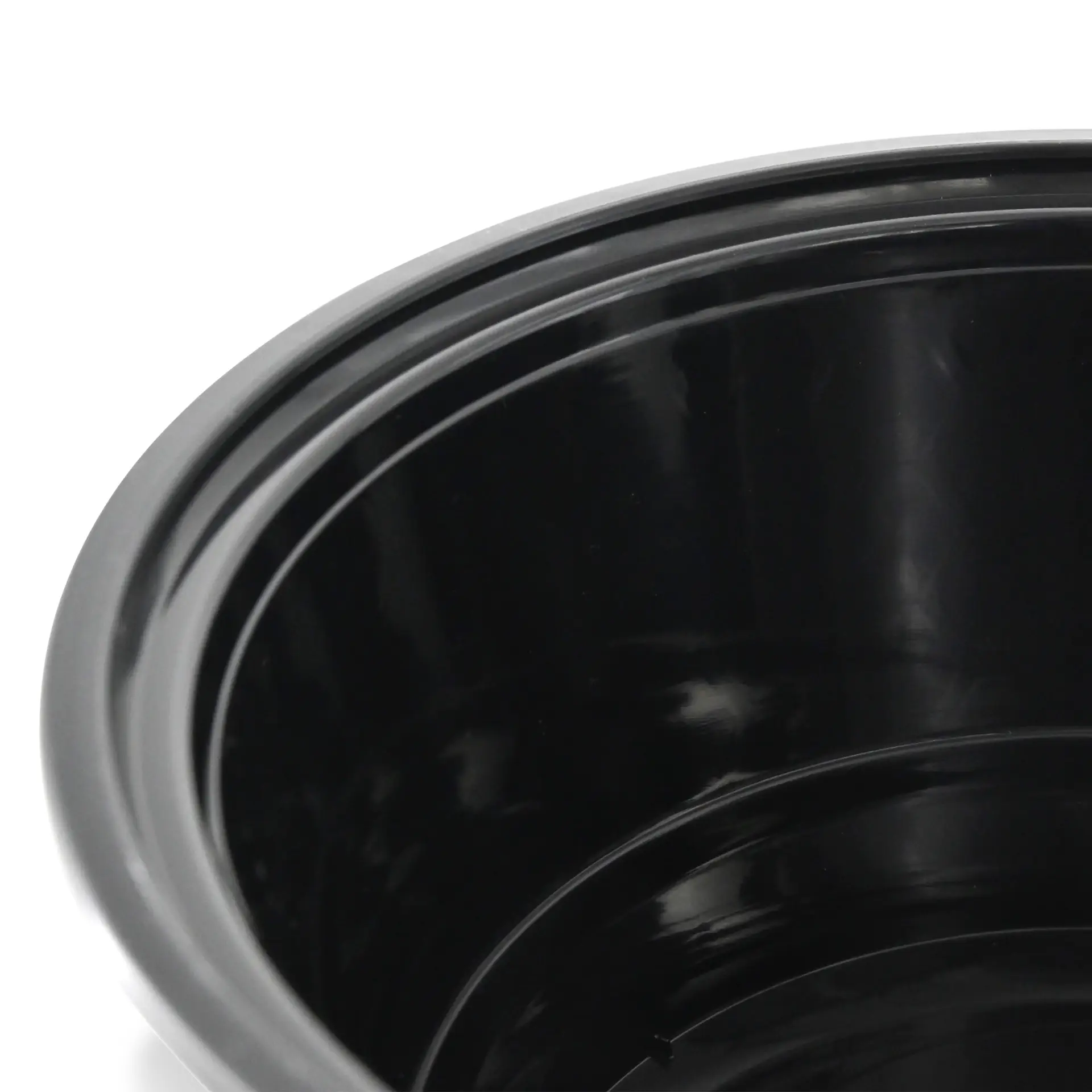 Reusable black food container made of polypropylene, designed for hot and cold dishes, microwave-safe and dishwasher-safe.