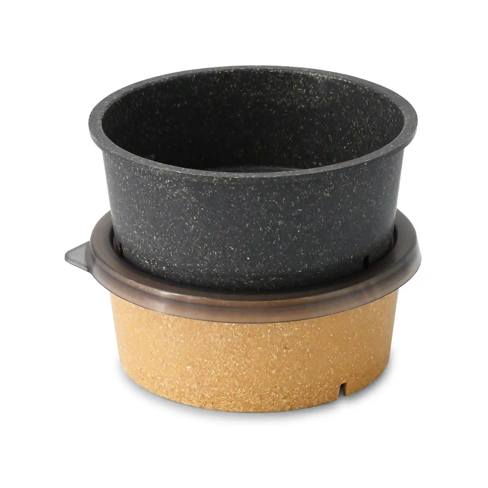 Stacked round bowls in black and beige, made of plastic, with a smooth surface and no visible markings.