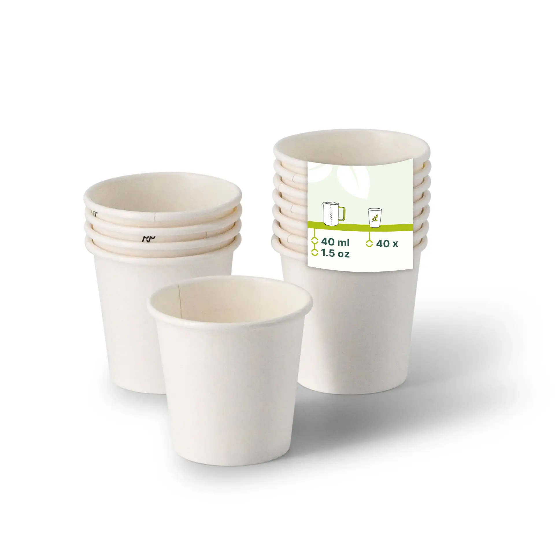 One white paper shot cup in focus, surrounded by several similar cups; cups are 40 ml / 1.5 oz, with calibration mark.