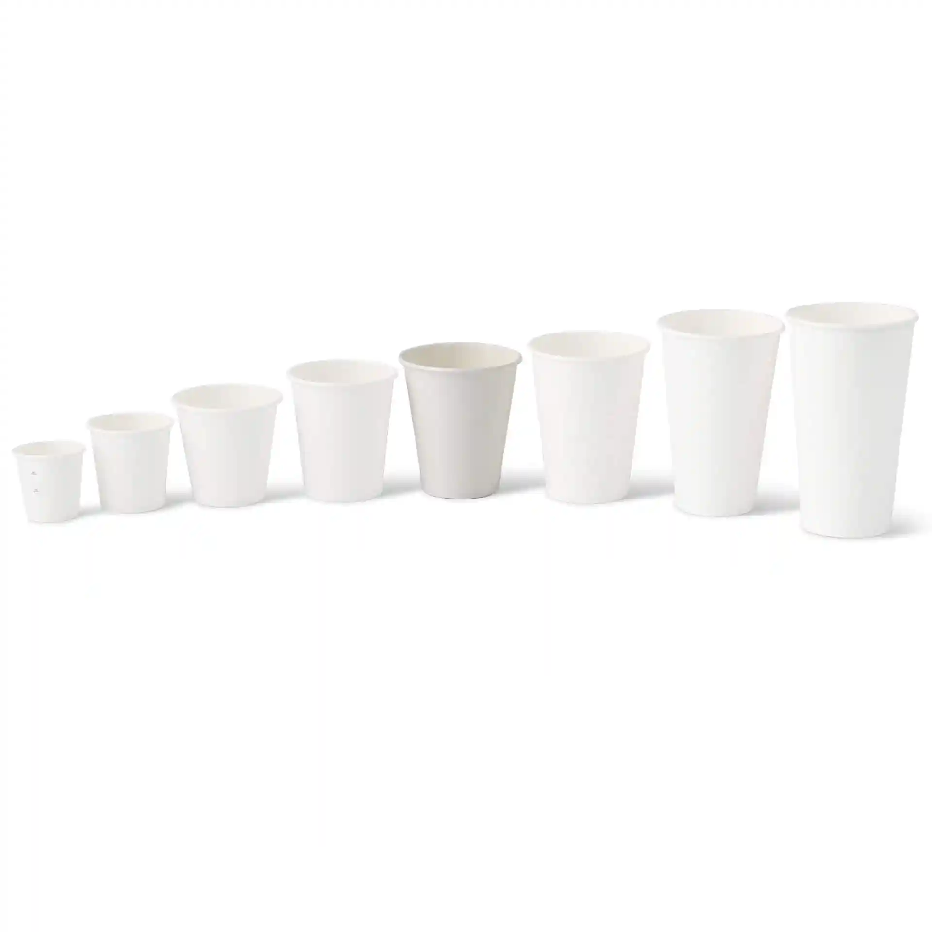 Set of eight white paper cups in varying sizes, arranged from smallest to largest, on a plain background.