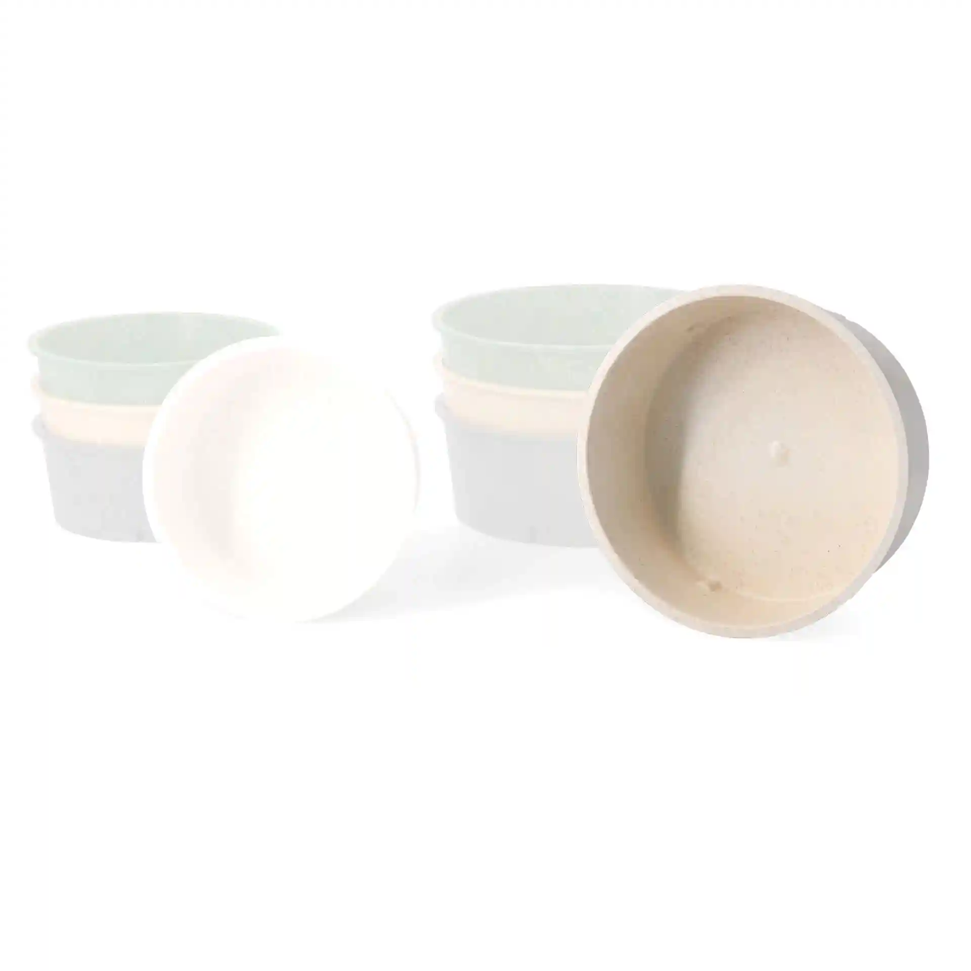 Image of several reusable bowls in cream white, including a round bowl with a visible interior and exterior.