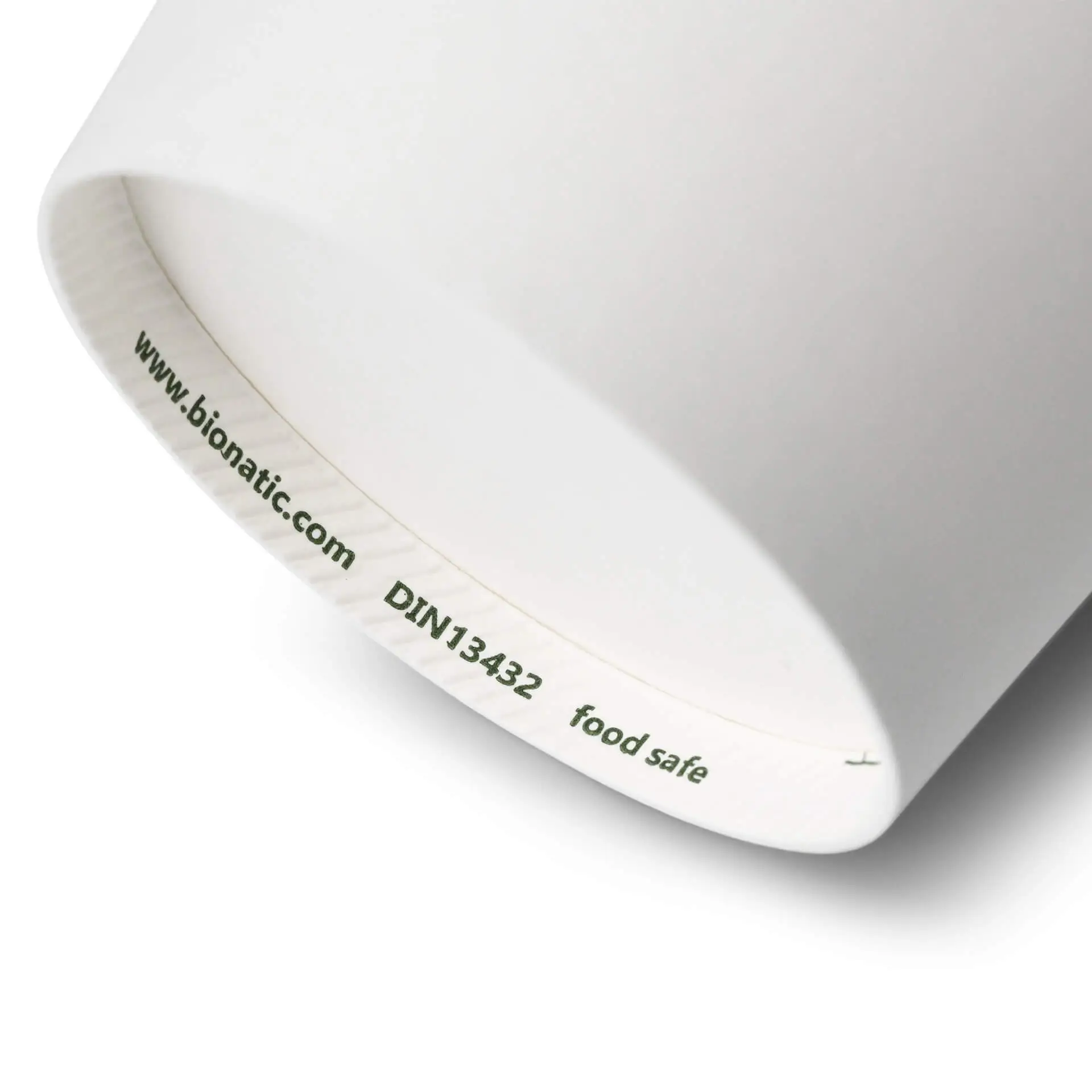 White 12 oz paper cup with a PE coating, showing the interior label indicating food safety and website details.