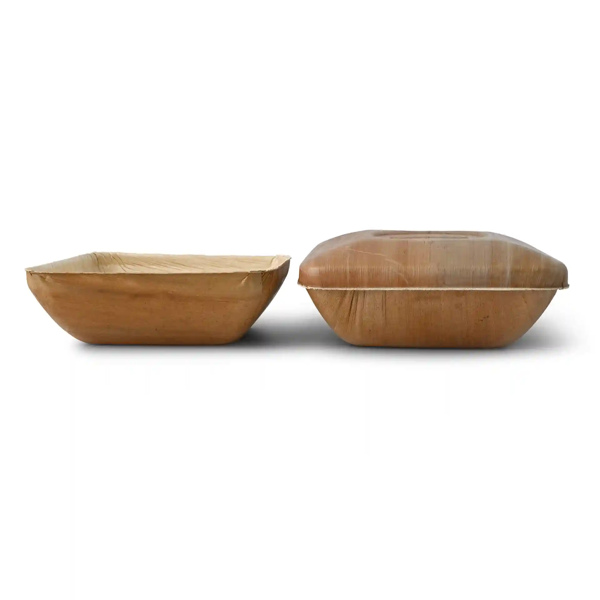 Image of two square palm leaf bowls, one with a lid, both displaying a natural grain color.