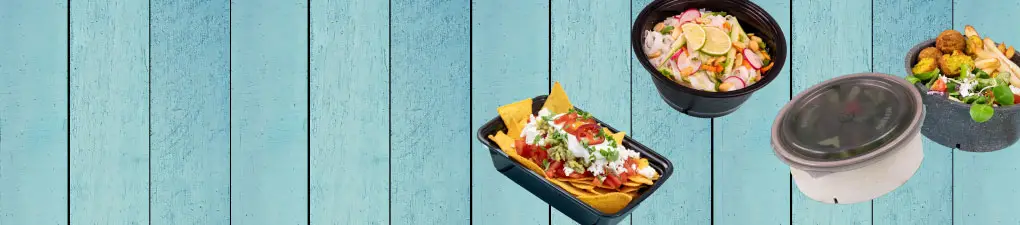 Alt text: Cartoon character with a green, smiling face sitting in a beige takeout bowl; three food dishes displayed alongside on a wooden blue background.