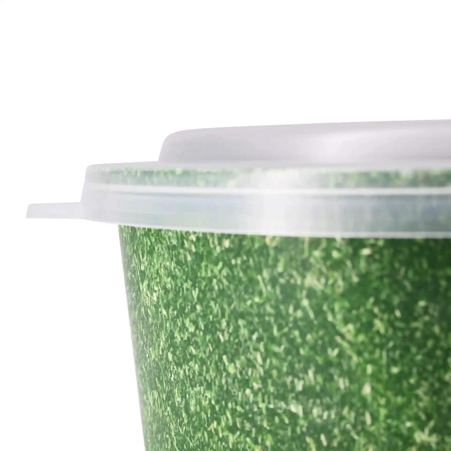 Transparent round bowl with a green textured exterior and a clear lid.