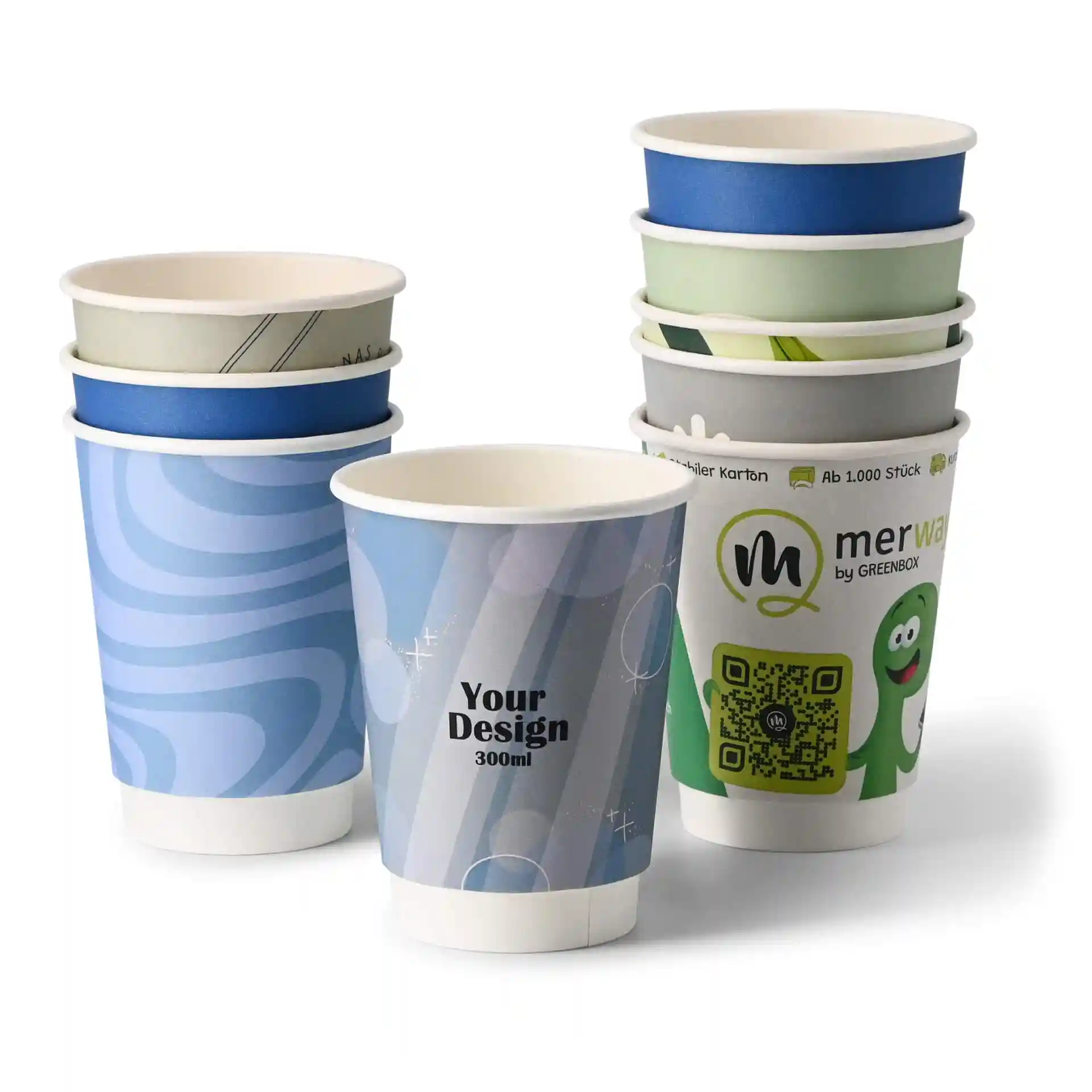 Stack of custom printed paper cups in various designs, featuring a blue swirl, a solid blue, and a white cup with a green character.