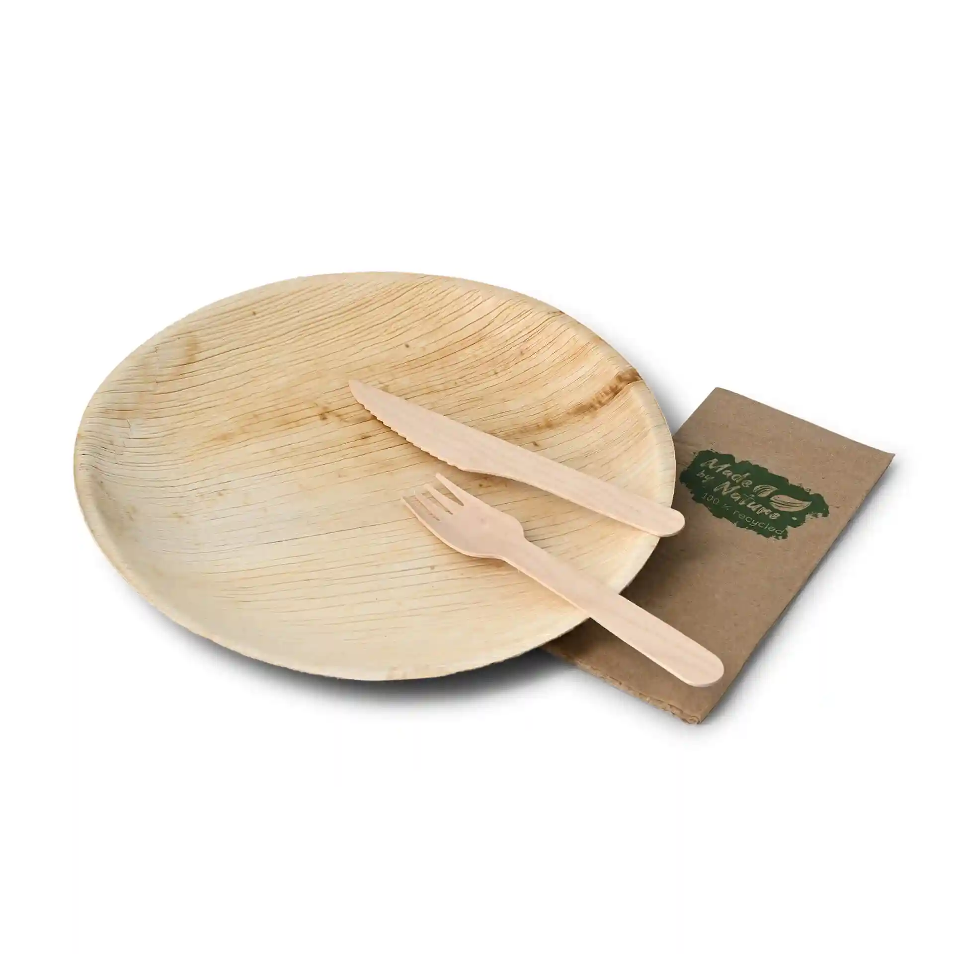 Round palm leaf plate with a diameter of 23 cm, accompanied by a wooden knife and fork on a kraft paper base.