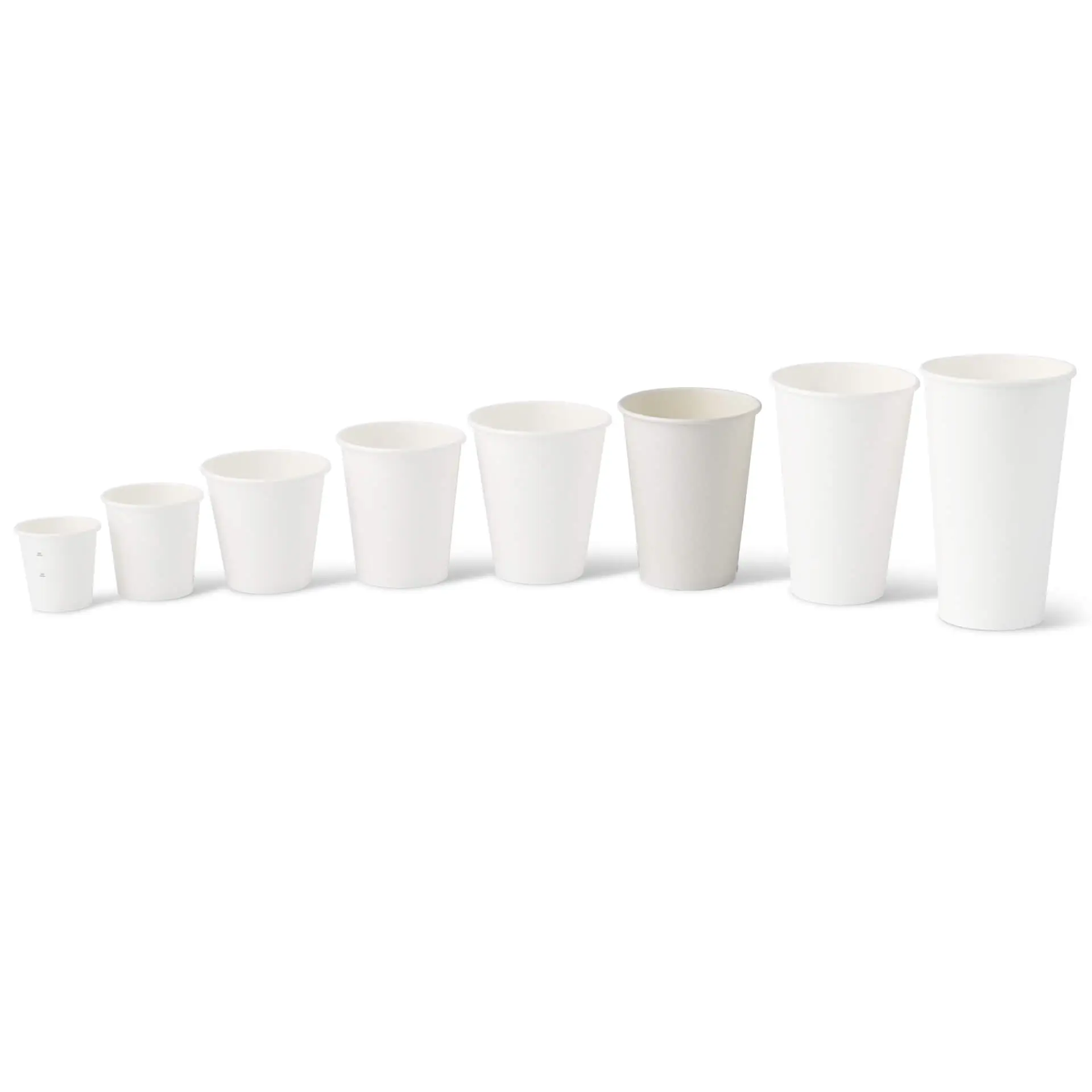 One white single-wall paper cup, 300 ml, with PLA coating; several smaller white cups with reduced opacity arranged beside it.