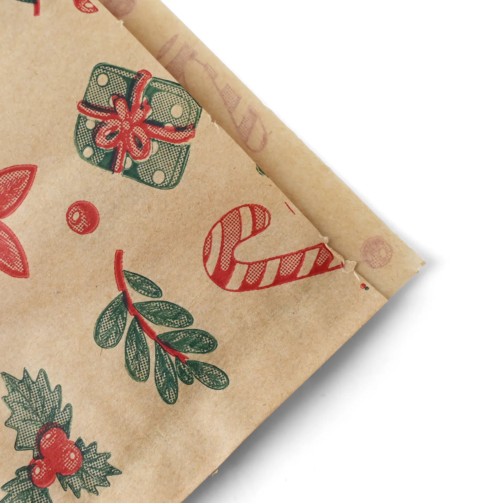 Brown greaseproof paper bag with a winter design featuring candy canes, gifts, and foliage. Measures 19 x 19 cm.