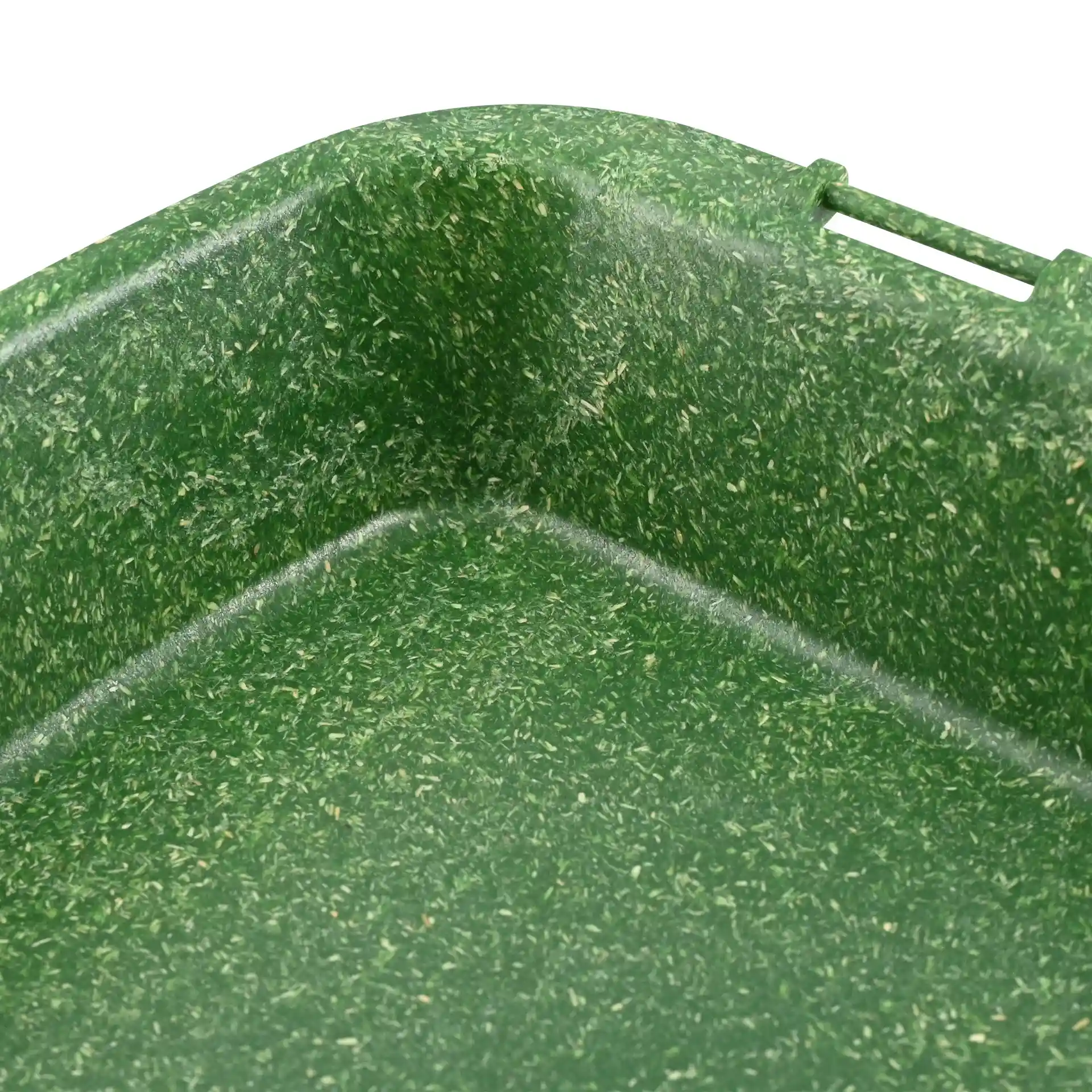 Close-up of a dark green reusable menu container with a textured surface and rounded corners.