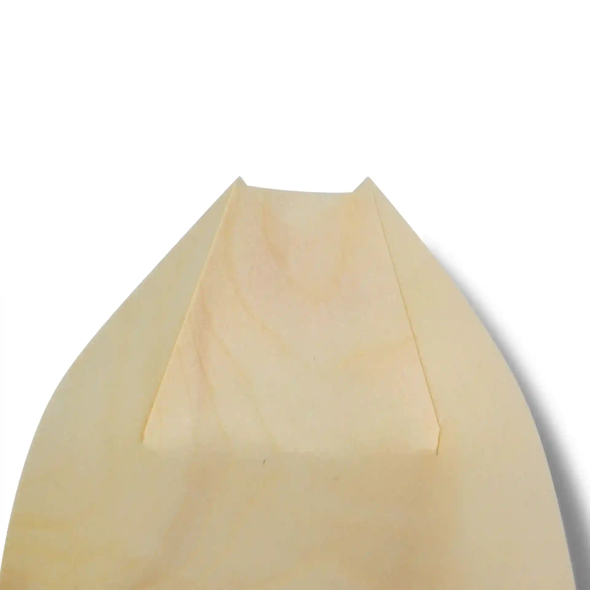 Top view of a wooden boat model with a pointed bow and smooth surface, in a light brown color.