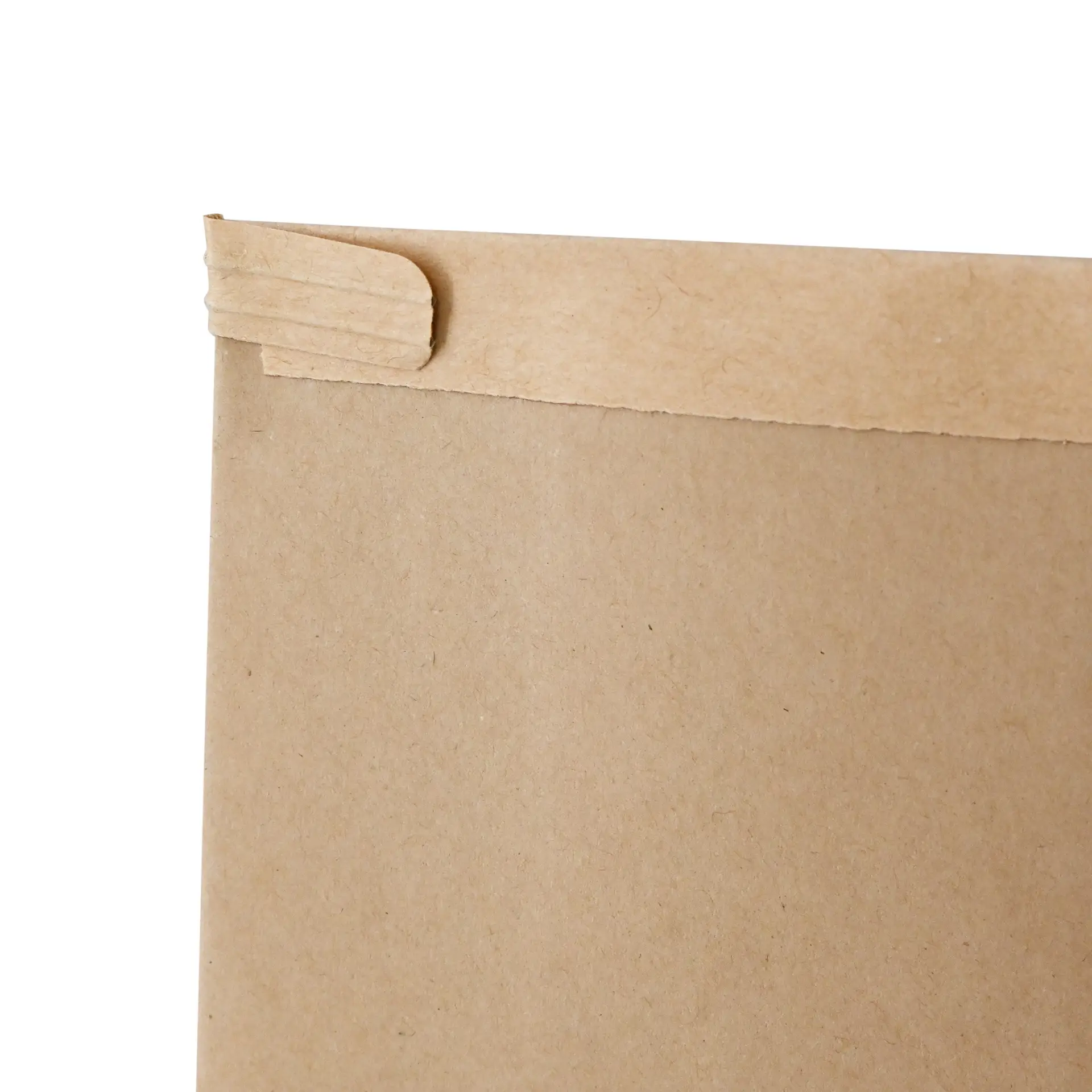 Brown kraft paper block bottom bag with a tin tie closure, showing the top edge and closure detail.