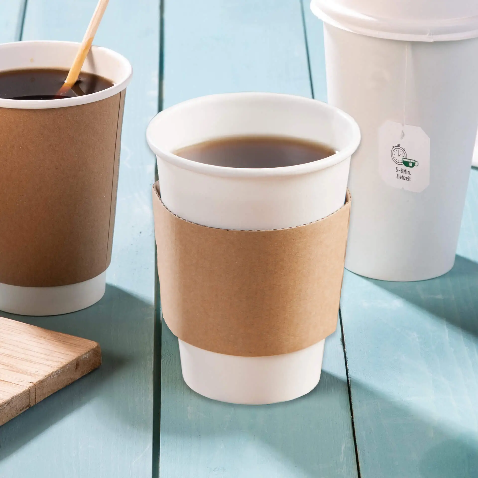 Brown cardboard cup sleeve for 300, 400, or 500 ml paper cups, providing grip and heat protection.