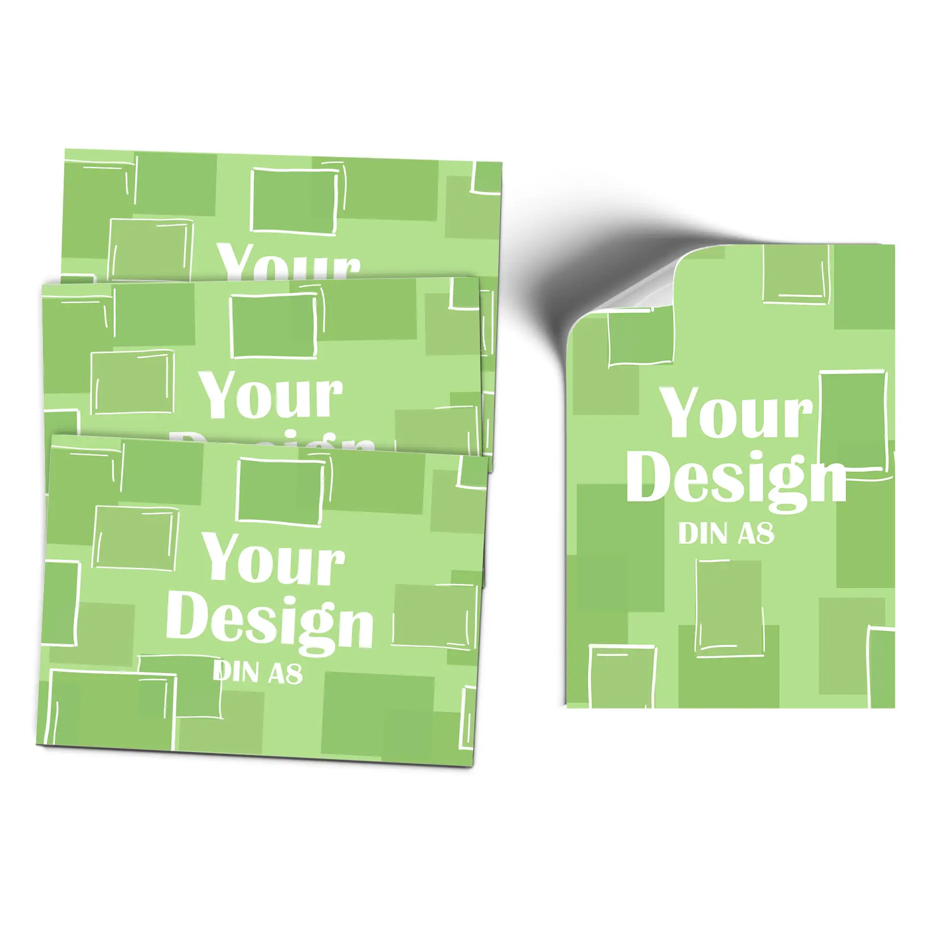 Four green labels designed for customization, featuring the phrase "Your Design" in white text, with a DIN A8 size.
