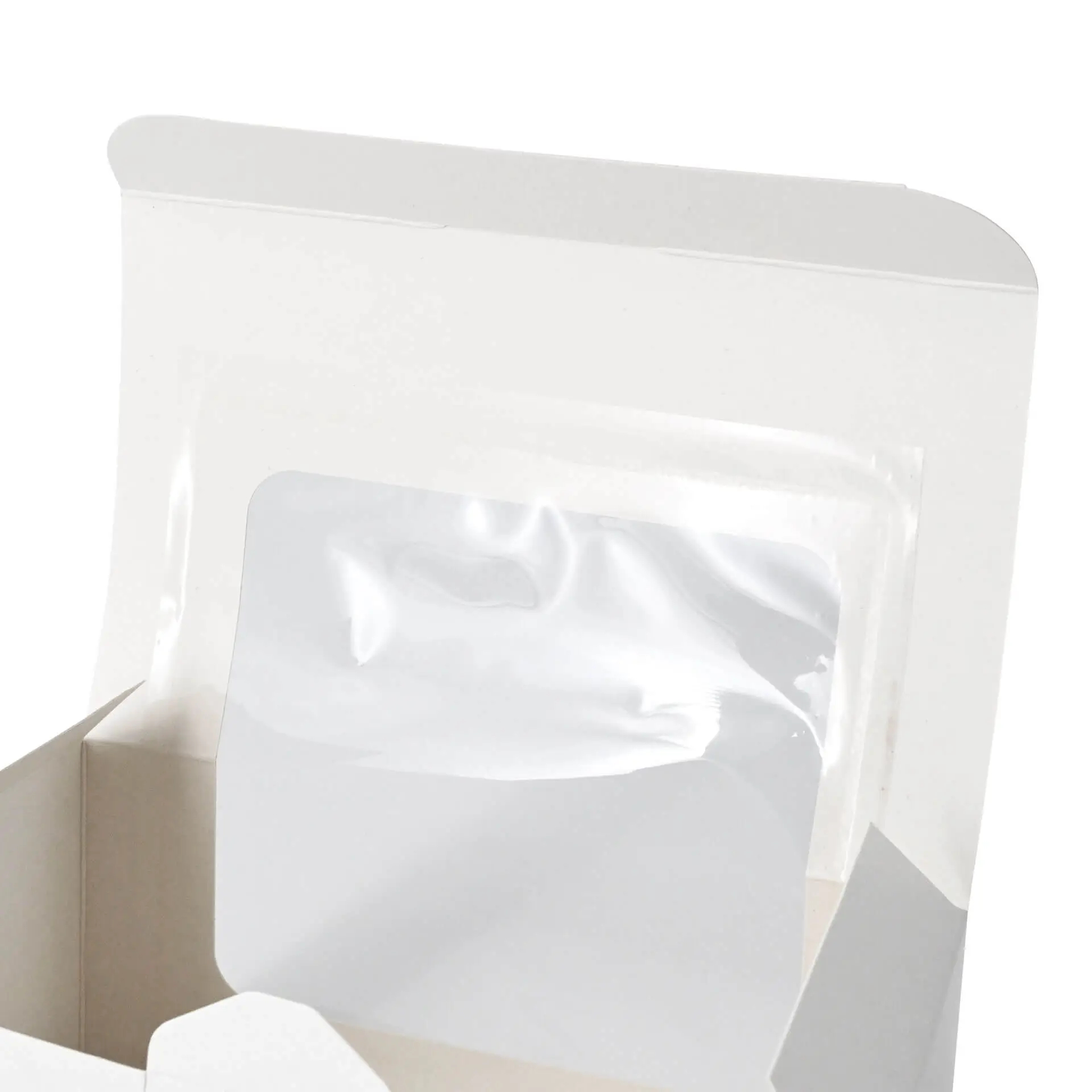 White cupcake box with a cellulose window and two compartments for baked goods inside.