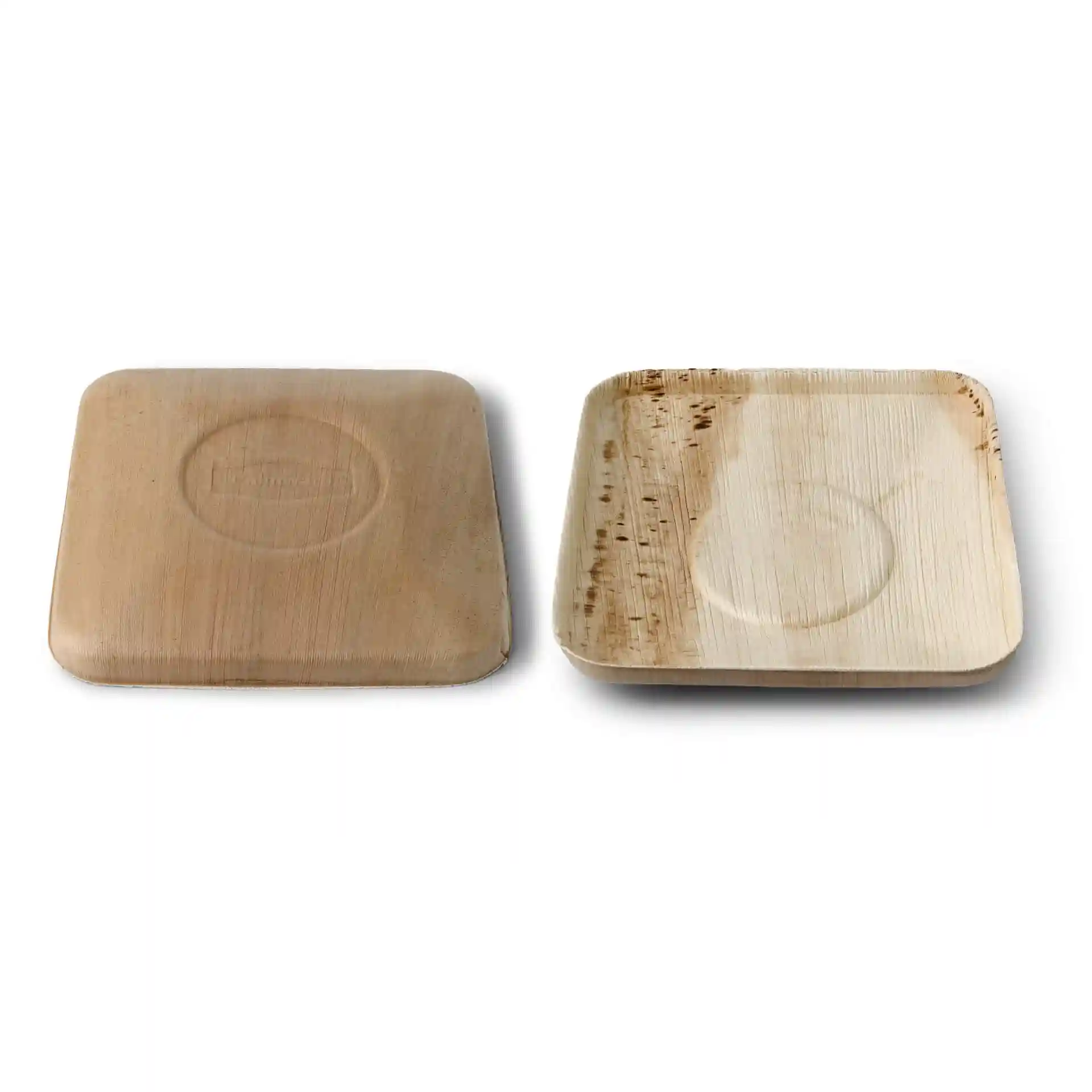 Square palm leaf bowls with a lid, showing a smooth surface and natural grain pattern.