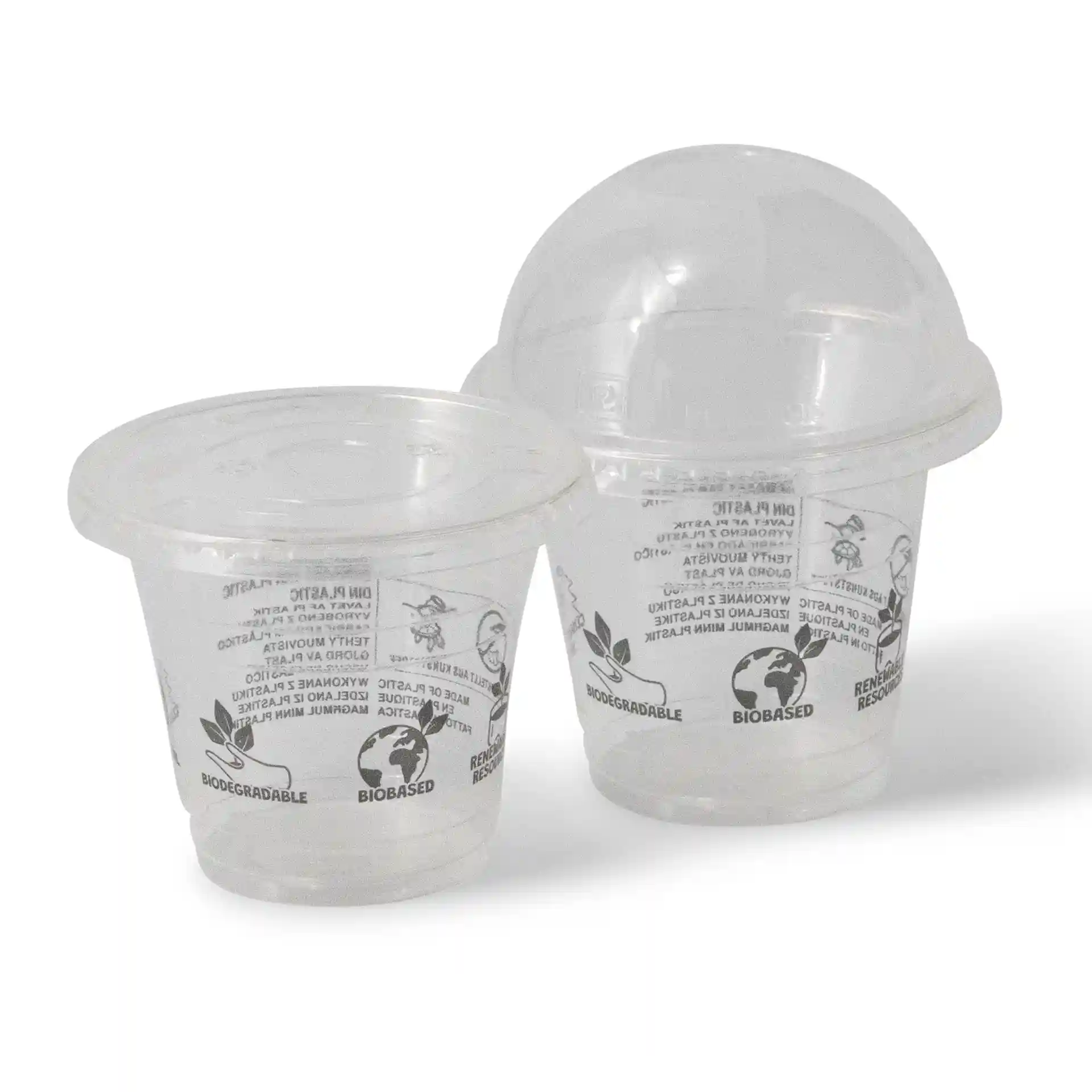 Transparent 8 oz PLA smoothie cups with smooth design, featuring a dome lid and markings on the sides.