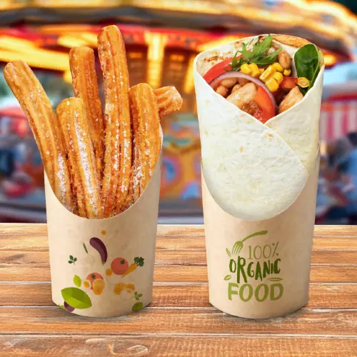 Churros in a paper cup next to a wrapped food item labeled "100% Organic Food" on a wooden surface.