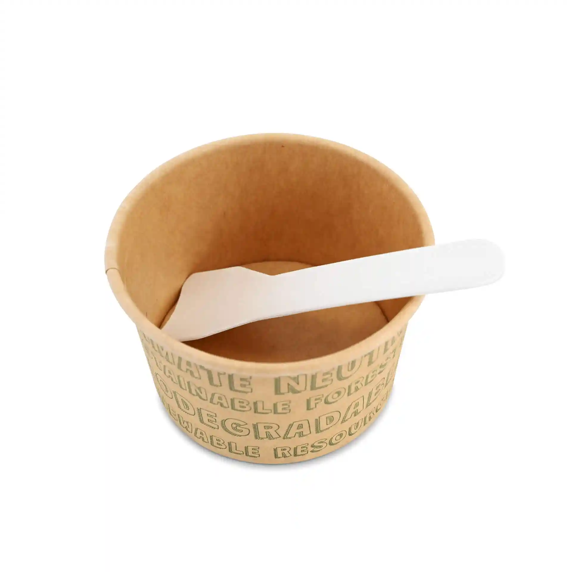 Paper cup with a brown exterior and a white spoon resting inside.