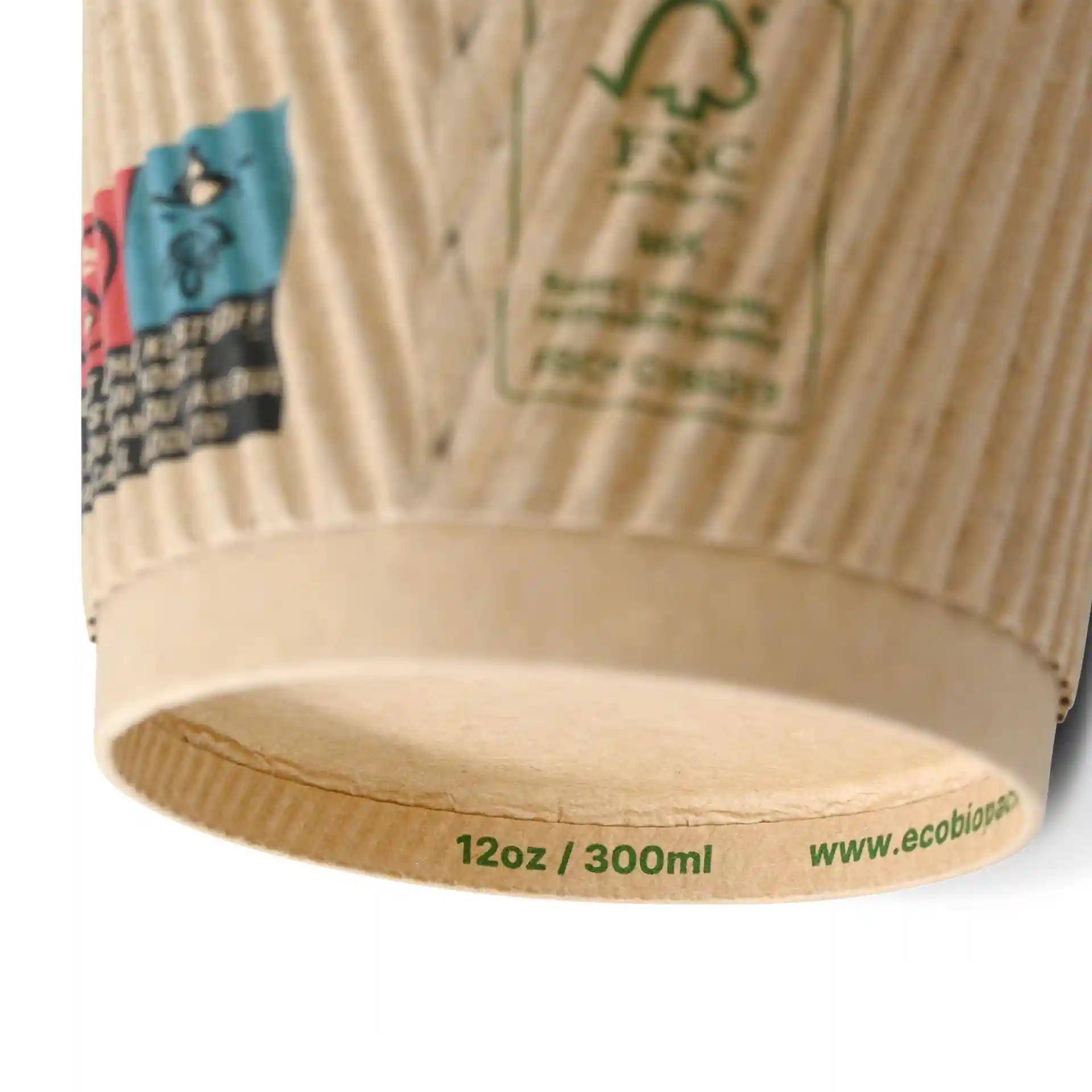 Ribbed kraft coffee cup with a diameter of 90 mm and a printed base indicating 12 oz / 300 ml capacity.