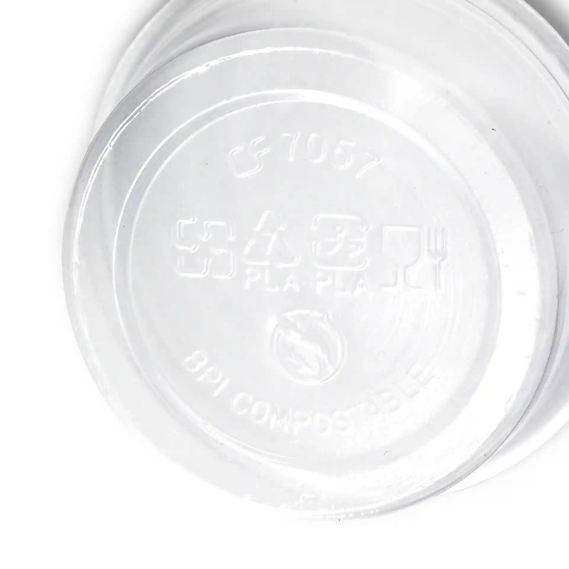 Transparent PLA portion cup with a diameter of 70 mm and a height of 25 mm, showing the base markings.