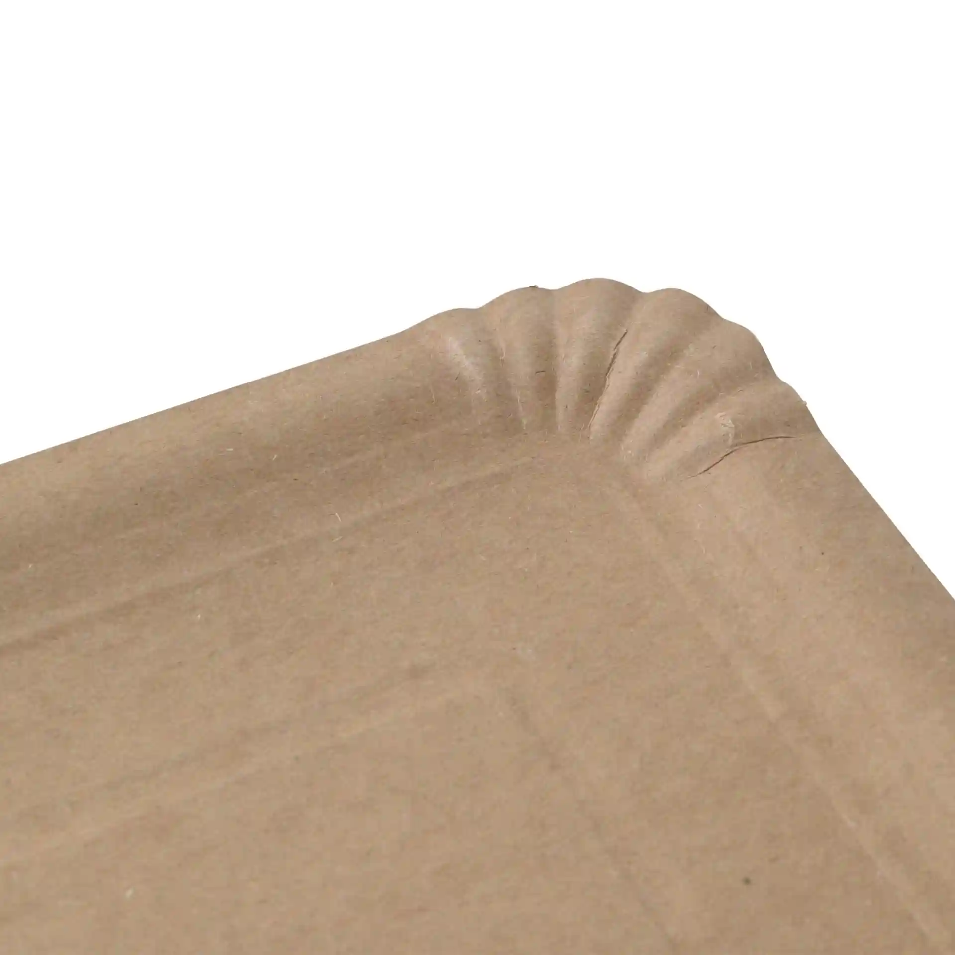 Close-up of a brown rectangular cardboard plate with a fluted edge.