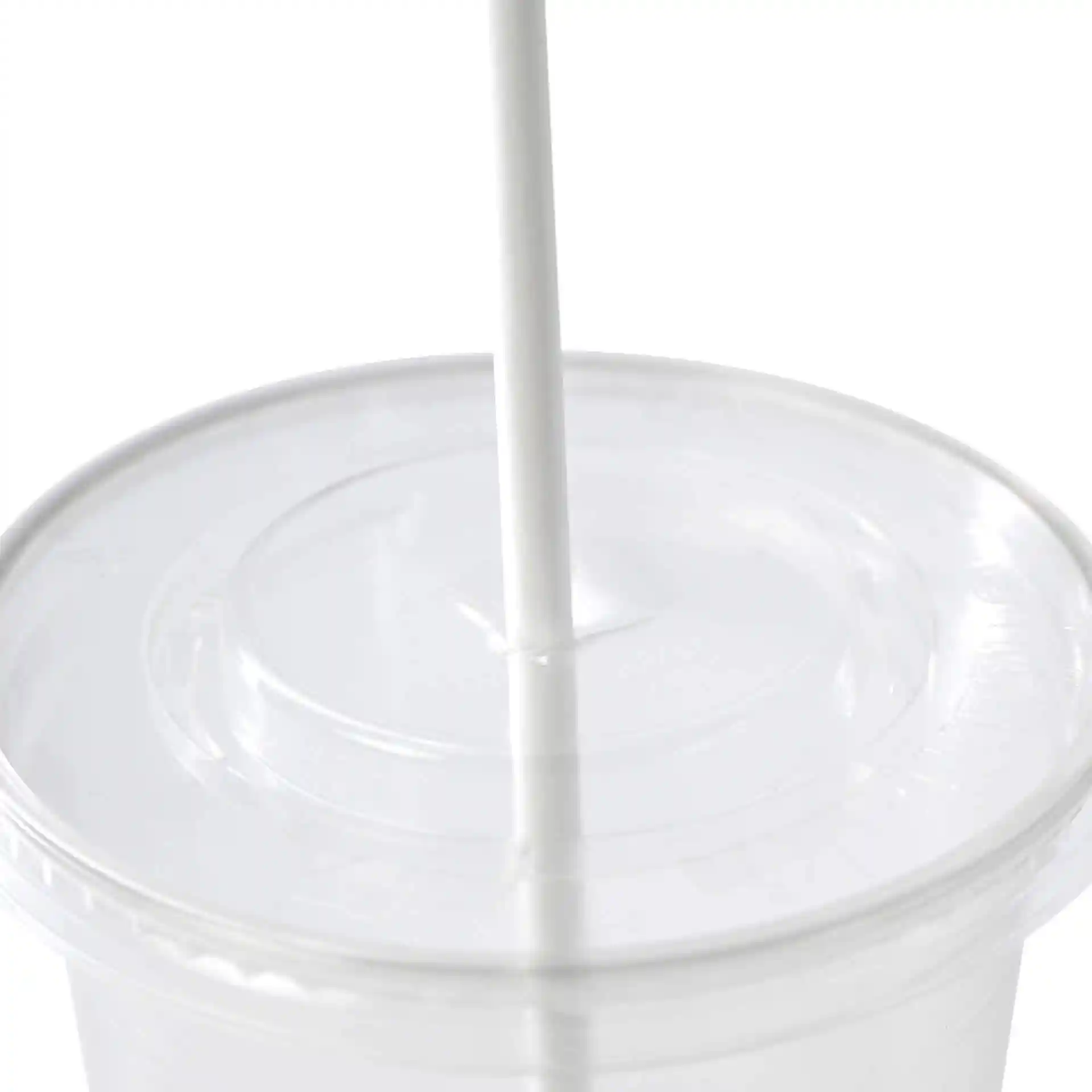White paper straw with a vertical splice, positioned in a clear cup lid.