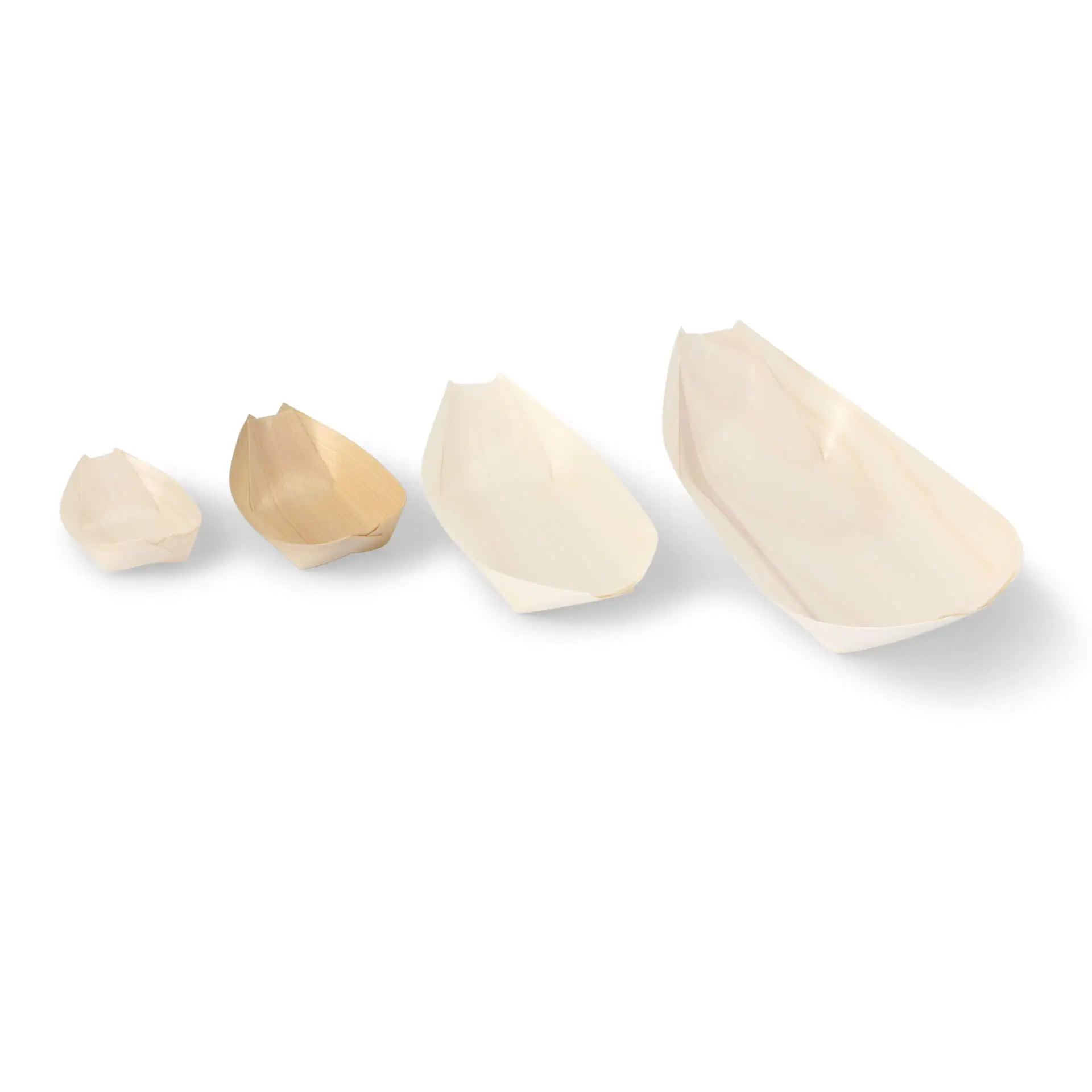 Four wooden boat-shaped containers in varying sizes, with the largest on the right and the smallest on the left.