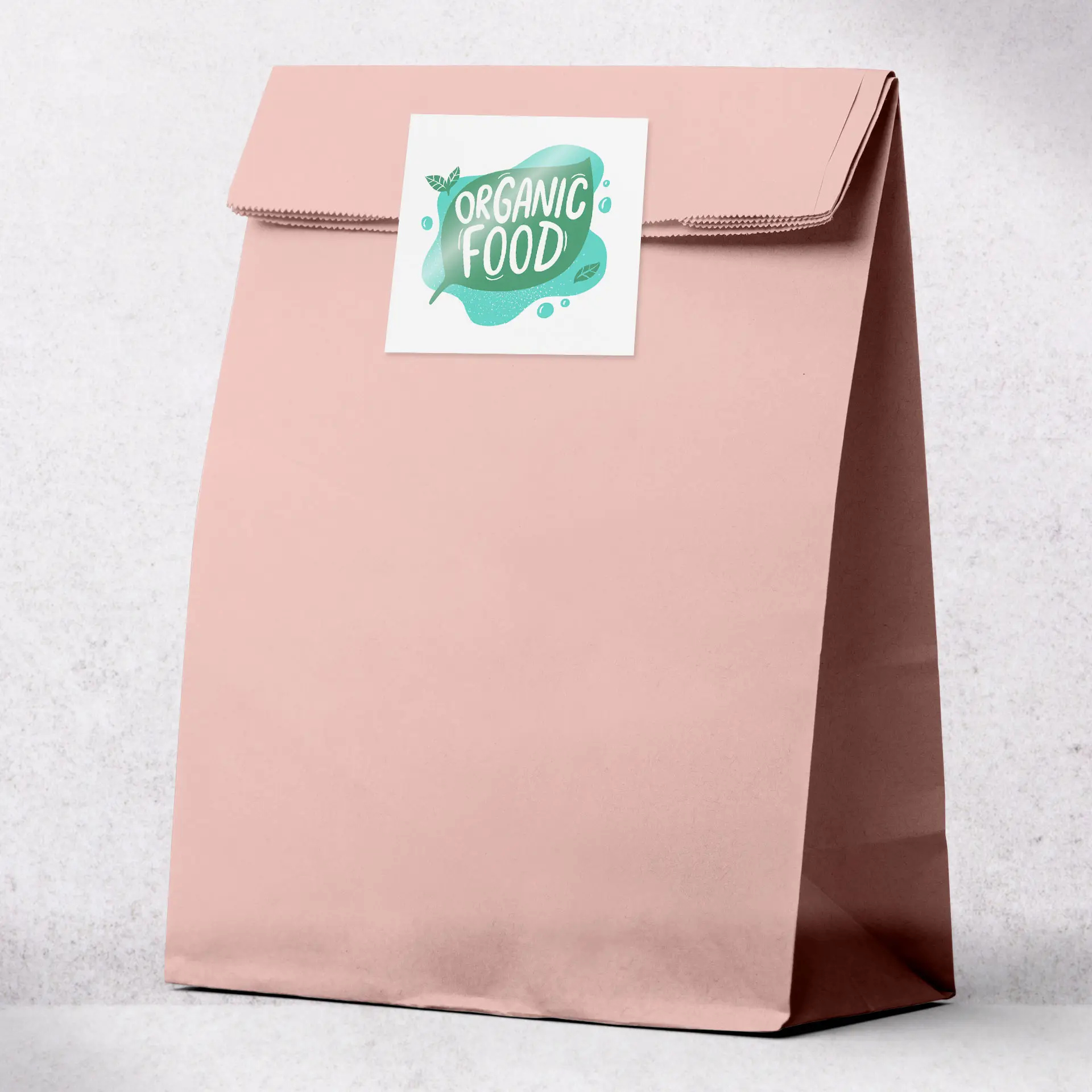 Pink paper bag with a square label featuring "Organic Food" design on a white background.