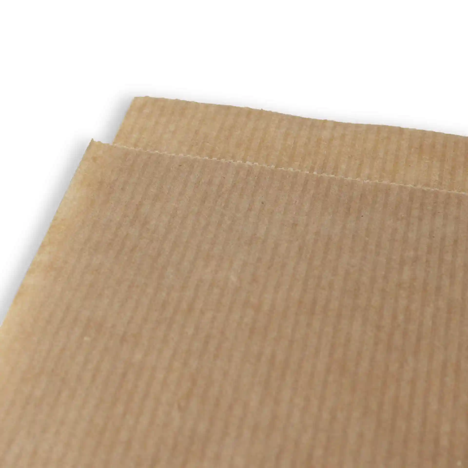 Close-up of a brown paper snack bag with two open sides and a textured surface.