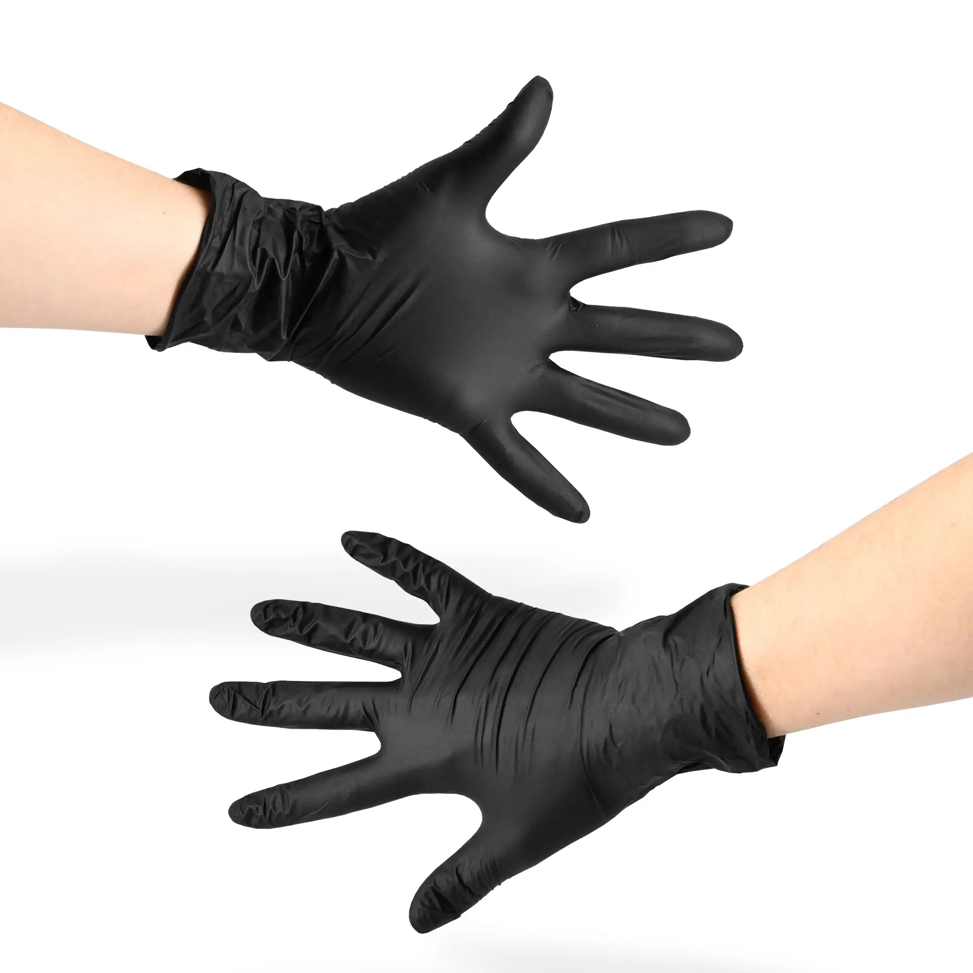 Two black powder-free nitrile gloves held in hands, showcasing a flexible fit and allergy-friendly design.