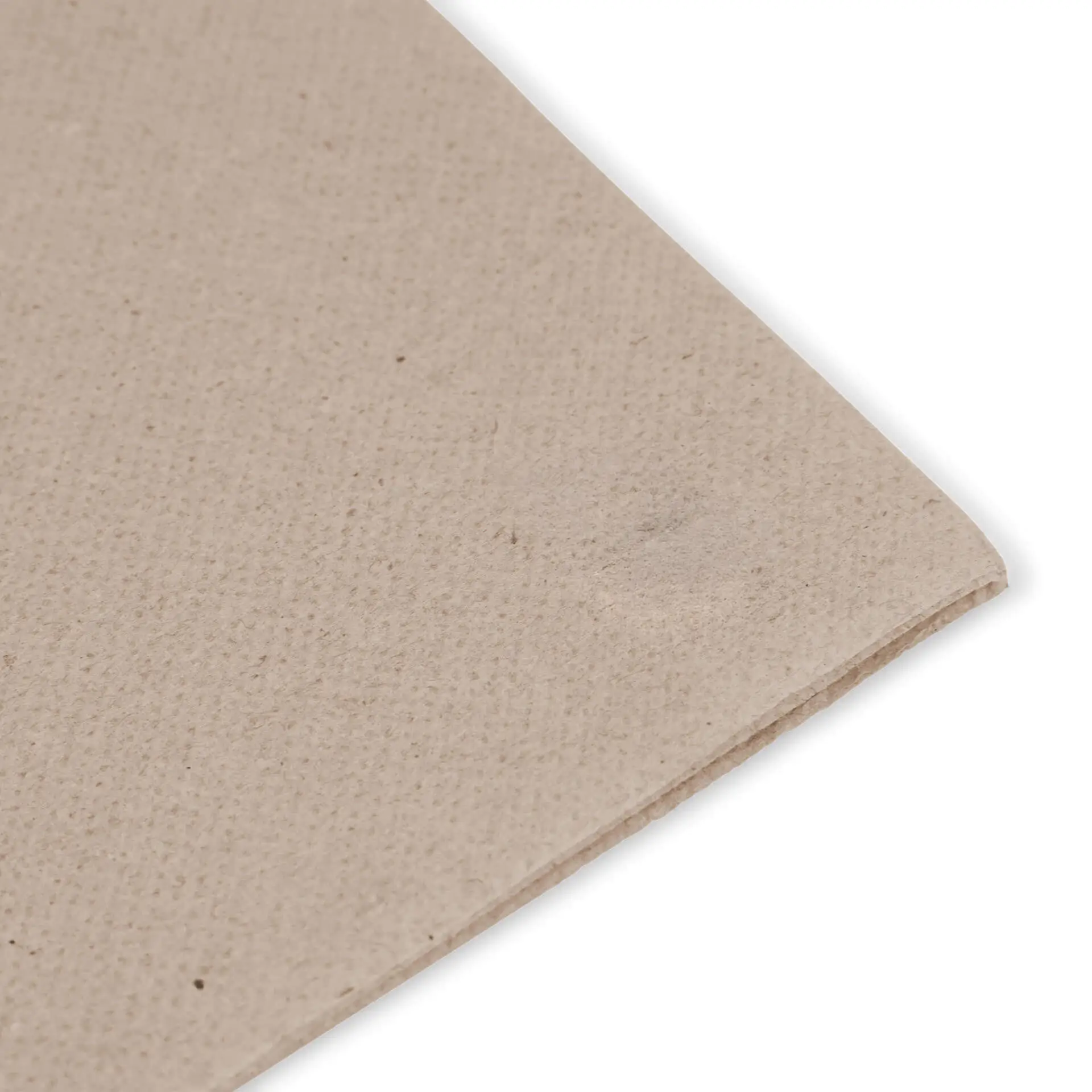 Close-up of unbleached recycled paper napkin showing a circular symbol and text indicating it is 100% recycled.