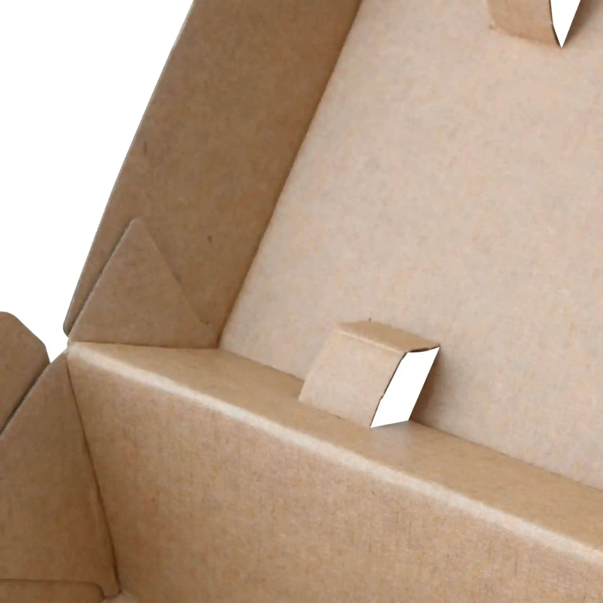 Close-up of the interior of a brown cardboard food box with a hinged lid and visible folding tabs.